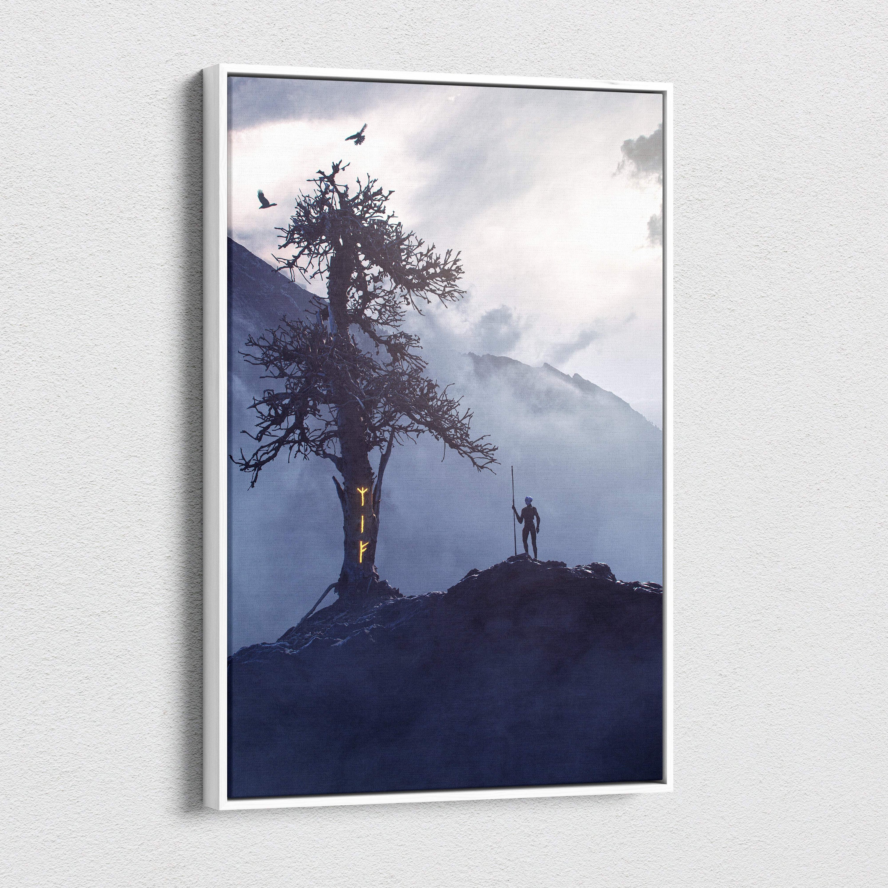 White-framed canvas art showing a lone figure on a rocky outcrop beside a glowing norse rune tree in a foggy blue landscape