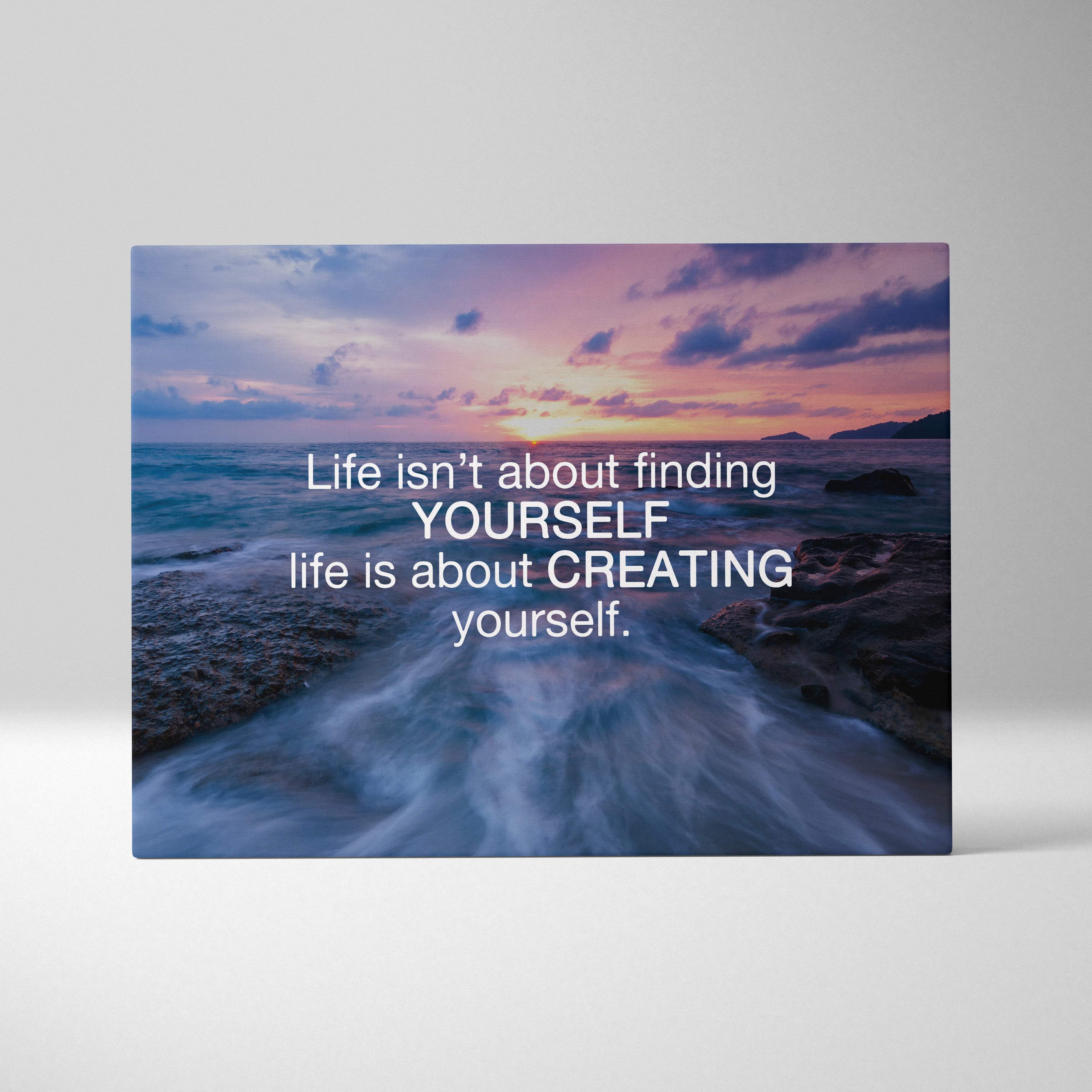 Inspirational ocean sunset canvas wall art with soft purple and orange hues and life is about creating yourself quote print