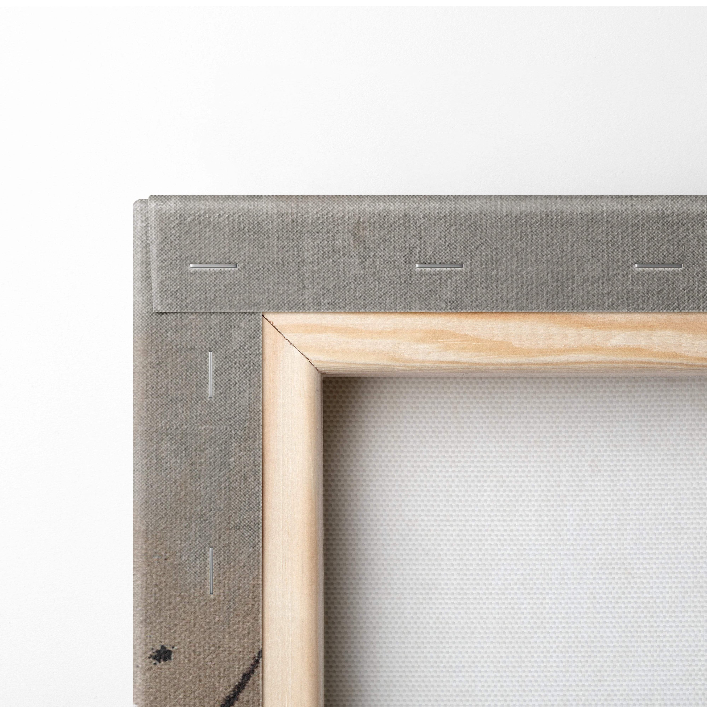 Light-colored wooden frame with gray canvas backing and stitching on muted floral spray painting style wall art print