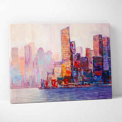A vibrant abstract cityscape painting on canvas with bold pink purple blue and orange strokes and a soft beige sky
