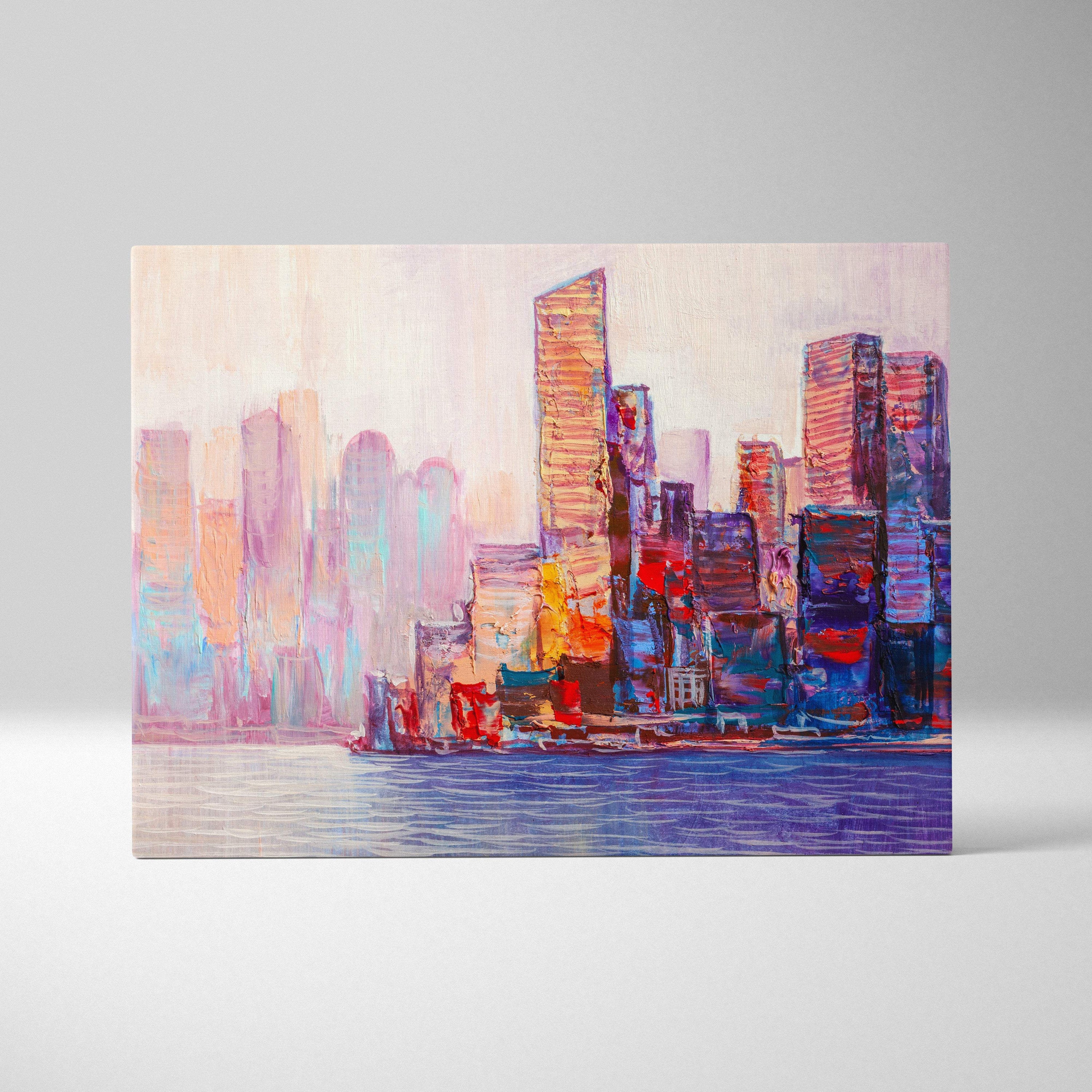 Vibrant abstract cityscape canvas print with bold purple pink blue and orange brushstrokes in pastel city skyline style