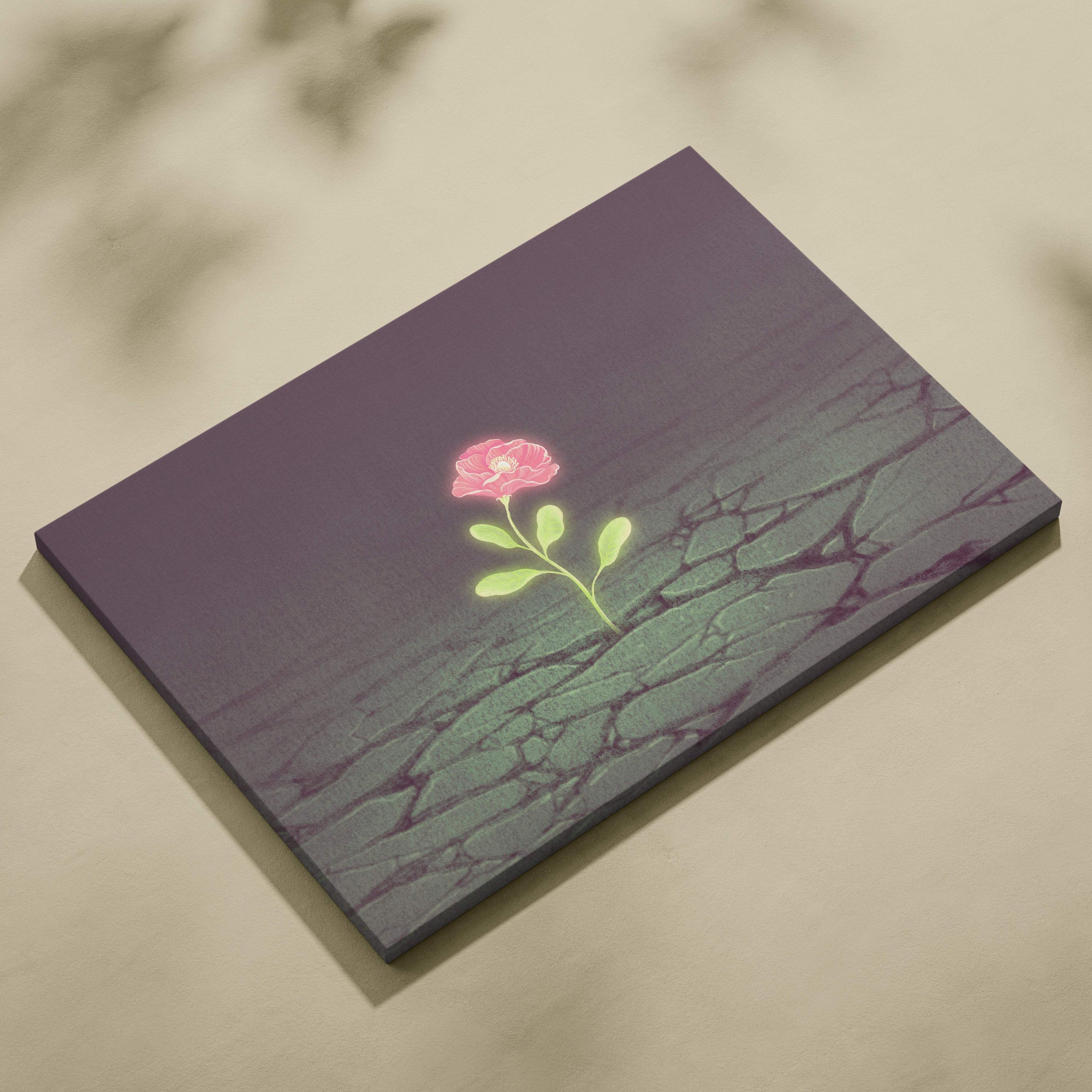 A rectangular canvas print of a glowing pink rose with green leaves on moody cracked purple and gray earth background