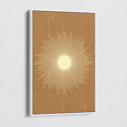 Minimalist framed boho sunburst canvas wall art with cream and gold tones on textured terracotta background for living room