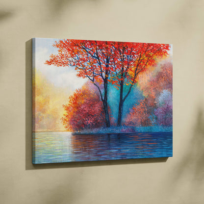Vibrant autumn trees canvas print featuring bold red orange and pink foliage with serene blue lake reflection wall art