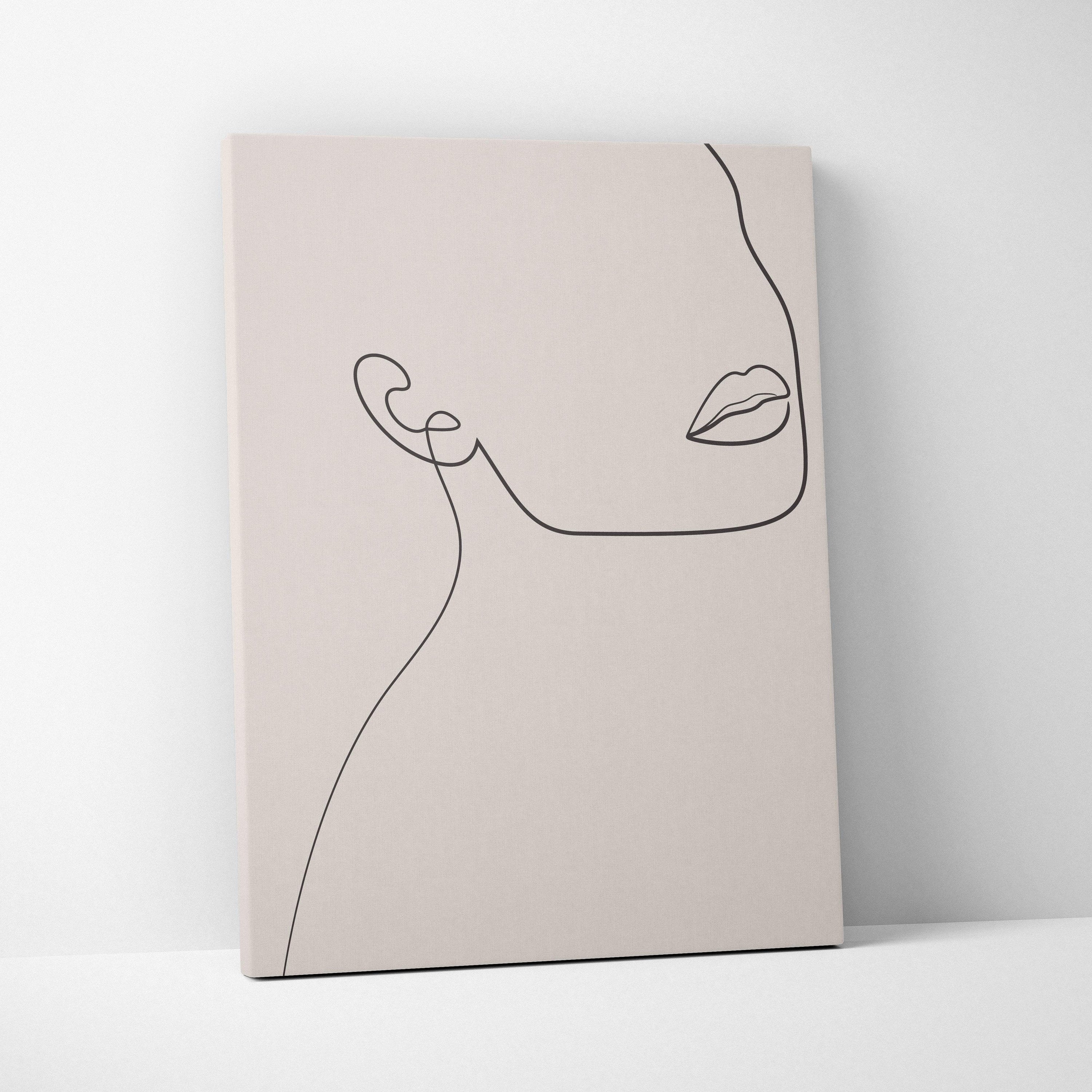 Boho minimalist line art face canvas print with delicate black profile drawing on soft beige background for home decor
