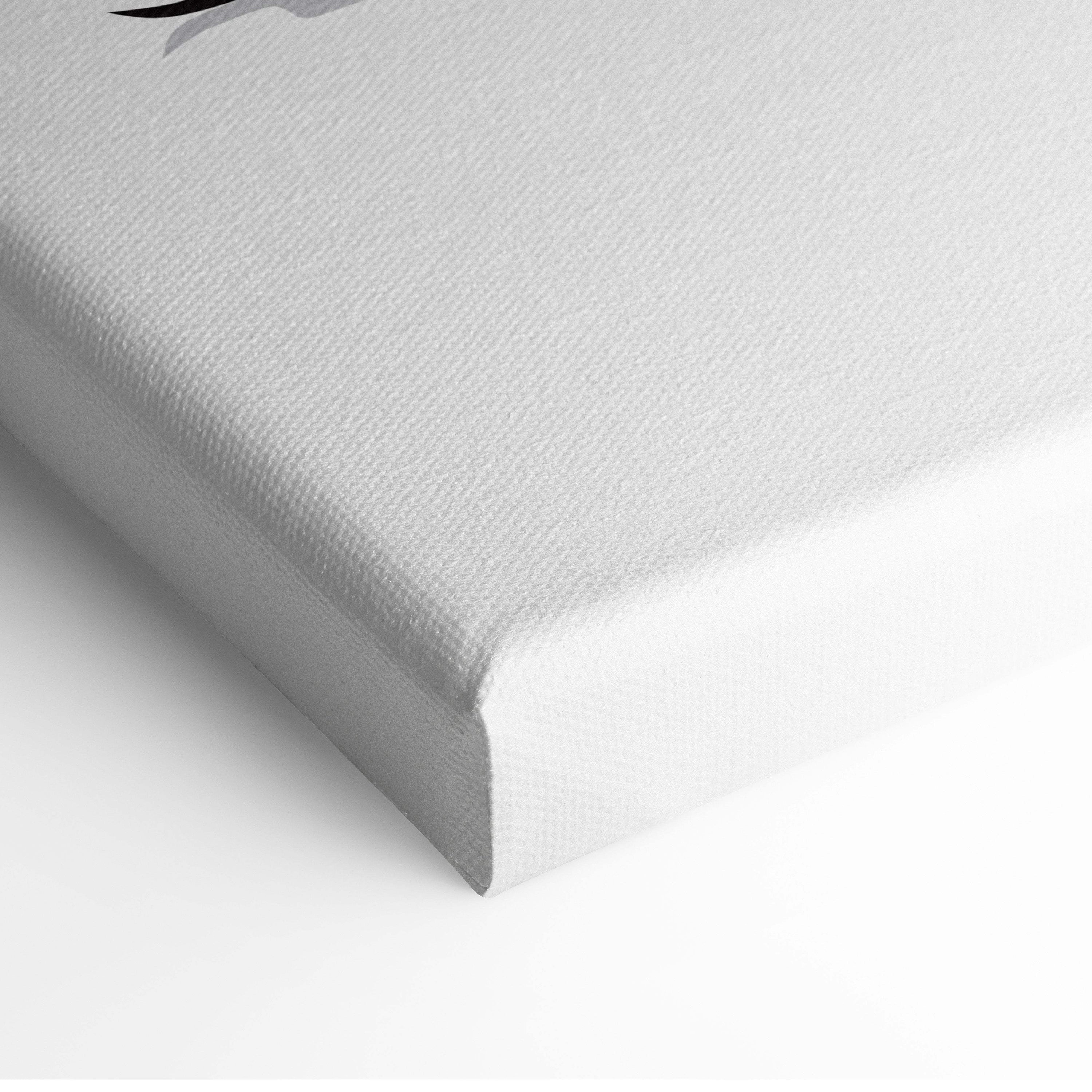 White canvas wall art with textured surface and black graphic detail featuring pink blossom mountain lake design