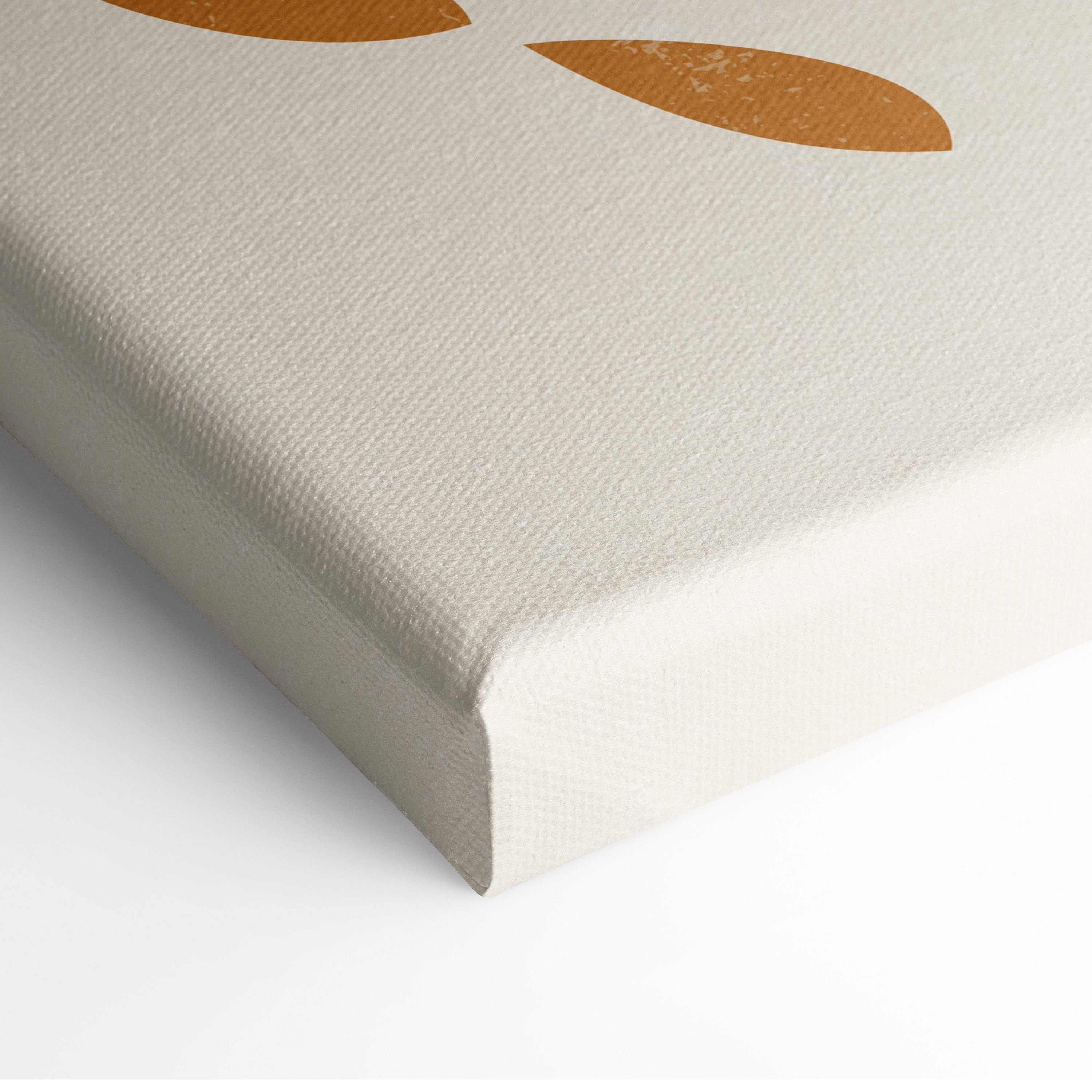 Beige canvas print featuring minimalist golden-brown leaf shapes in terracotta dusty blue and neutral beige boho decor