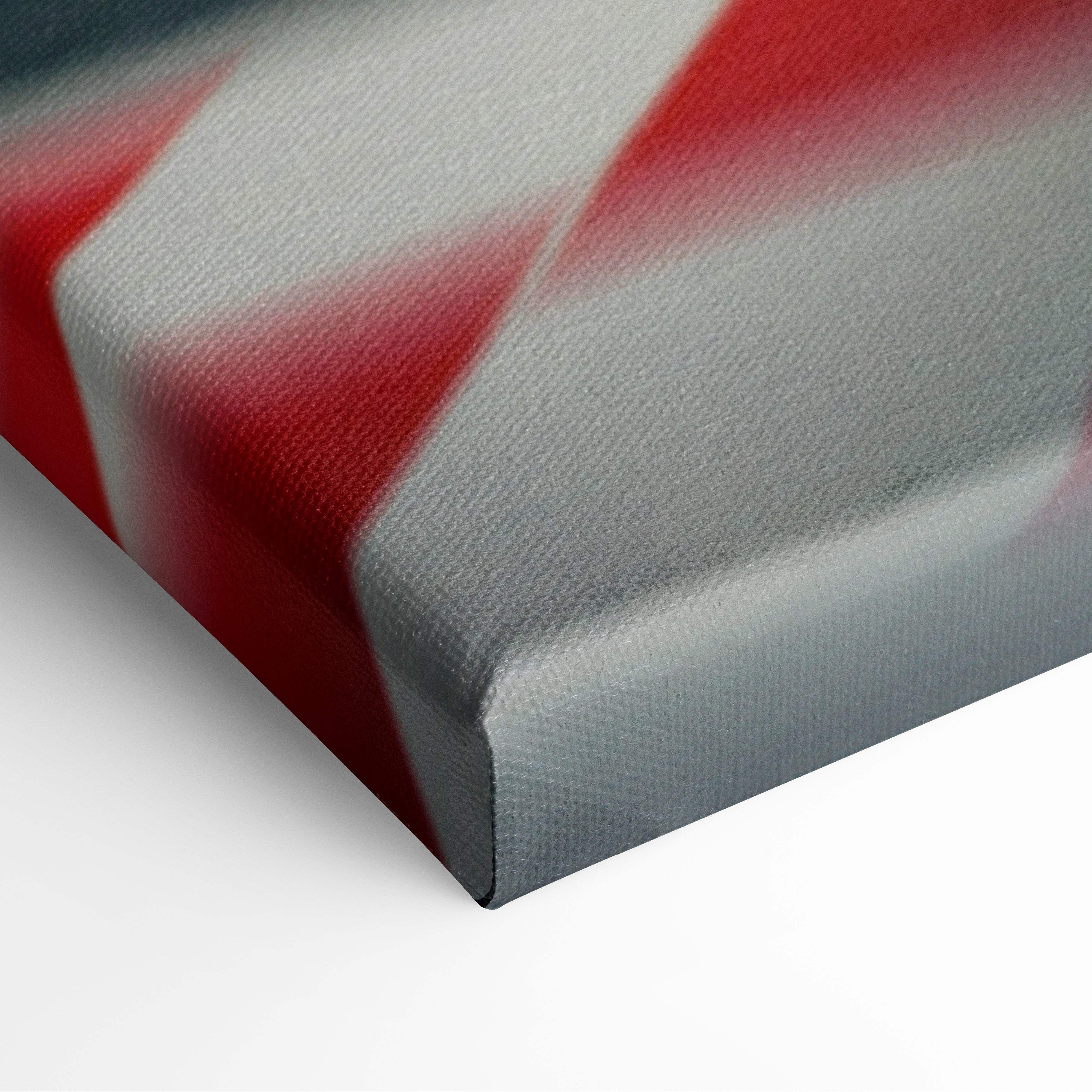 Red formula racing car canvas wall art print with bold red and gray diagonal stripes on textured surface for modern decor