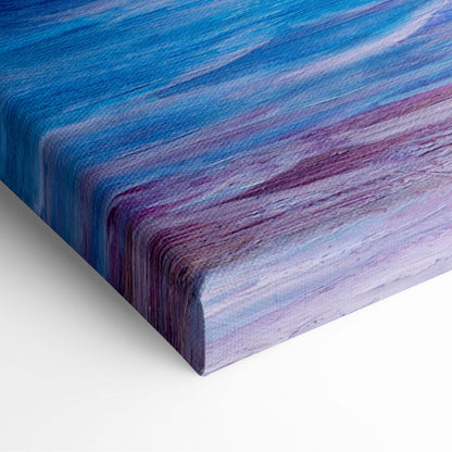 A canvas print of pastel ocean waves at sunrise with deep blue and purple textured abstract seascape art