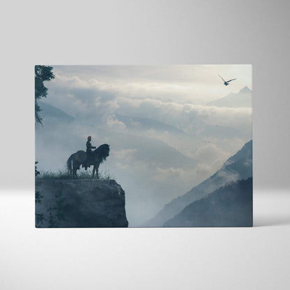 Rectangular canvas art of a lone rider on horseback silhouetted against misty mountains with an eagle soaring above