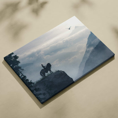 Rectangular canvas print of a lone rider silhouette on horseback at cliff edge with misty mountains and flying bird