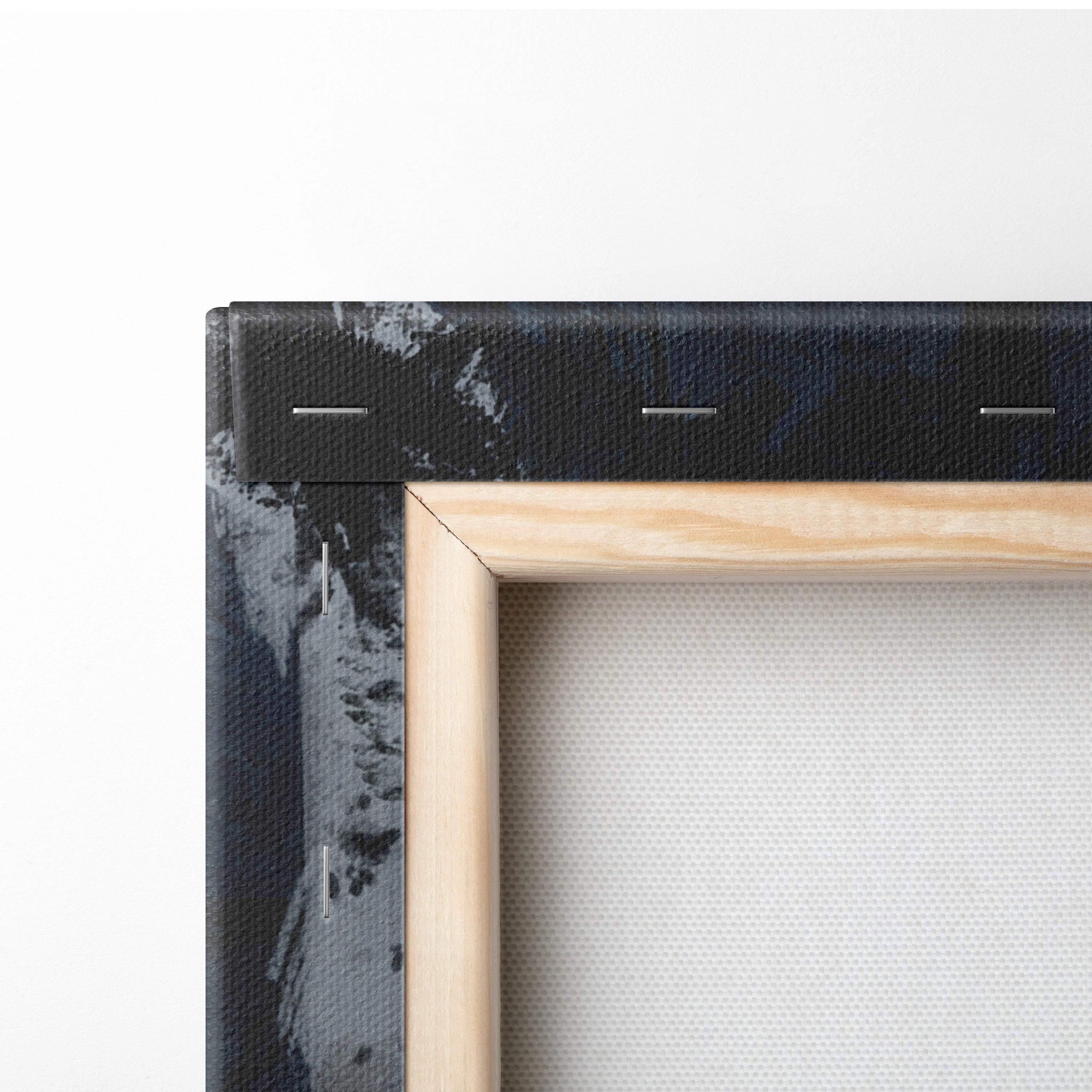 A minimalist dark fantasy ruins canvas print with black textured border and light wood frame for gothic decor