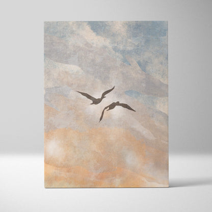 Boho coastal sky canvas wall art with silhouetted birds in flight on soft blue peach watercolor sky print