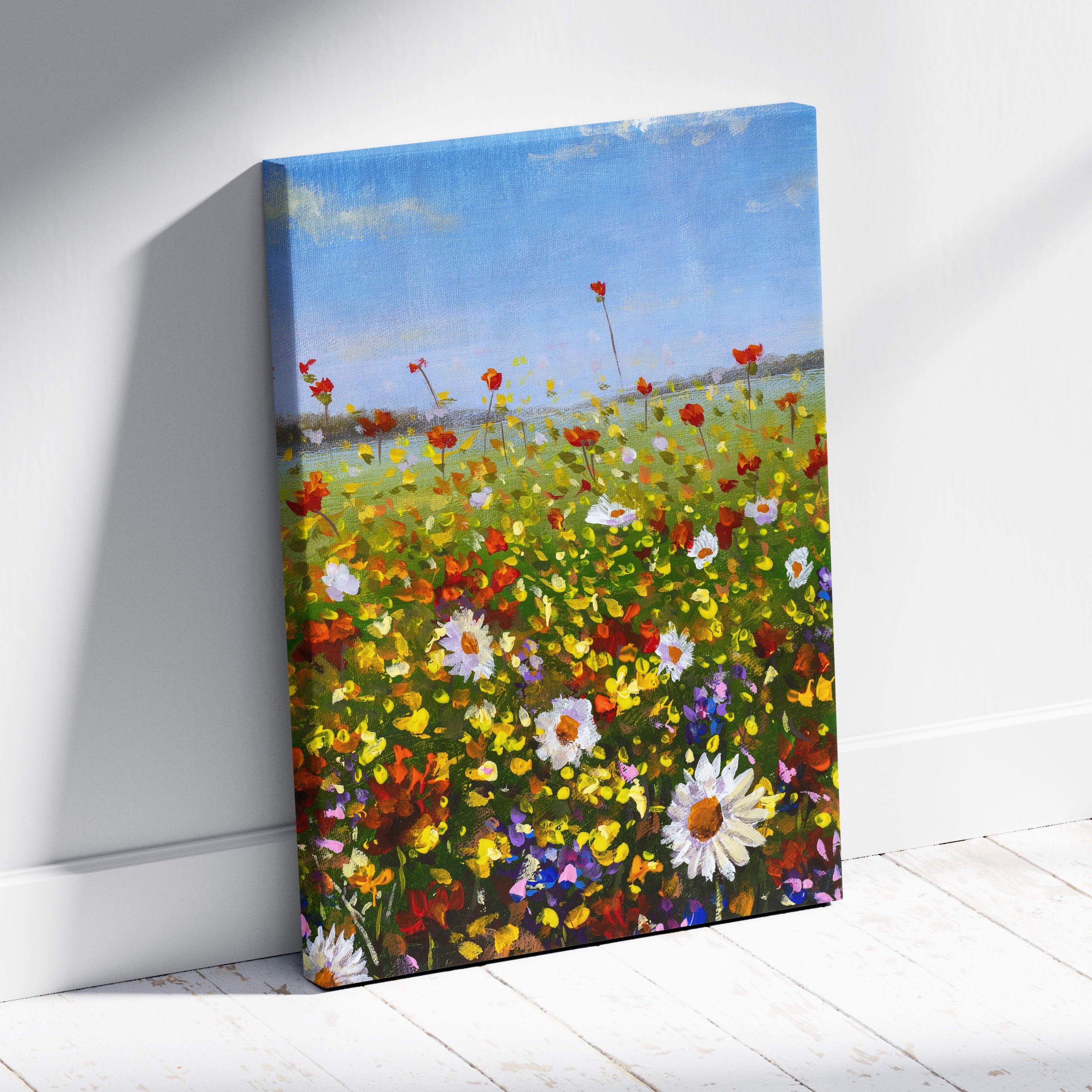 Vibrant wildflower meadow landscape canvas print with red yellow and white daisies under a bright blue sky