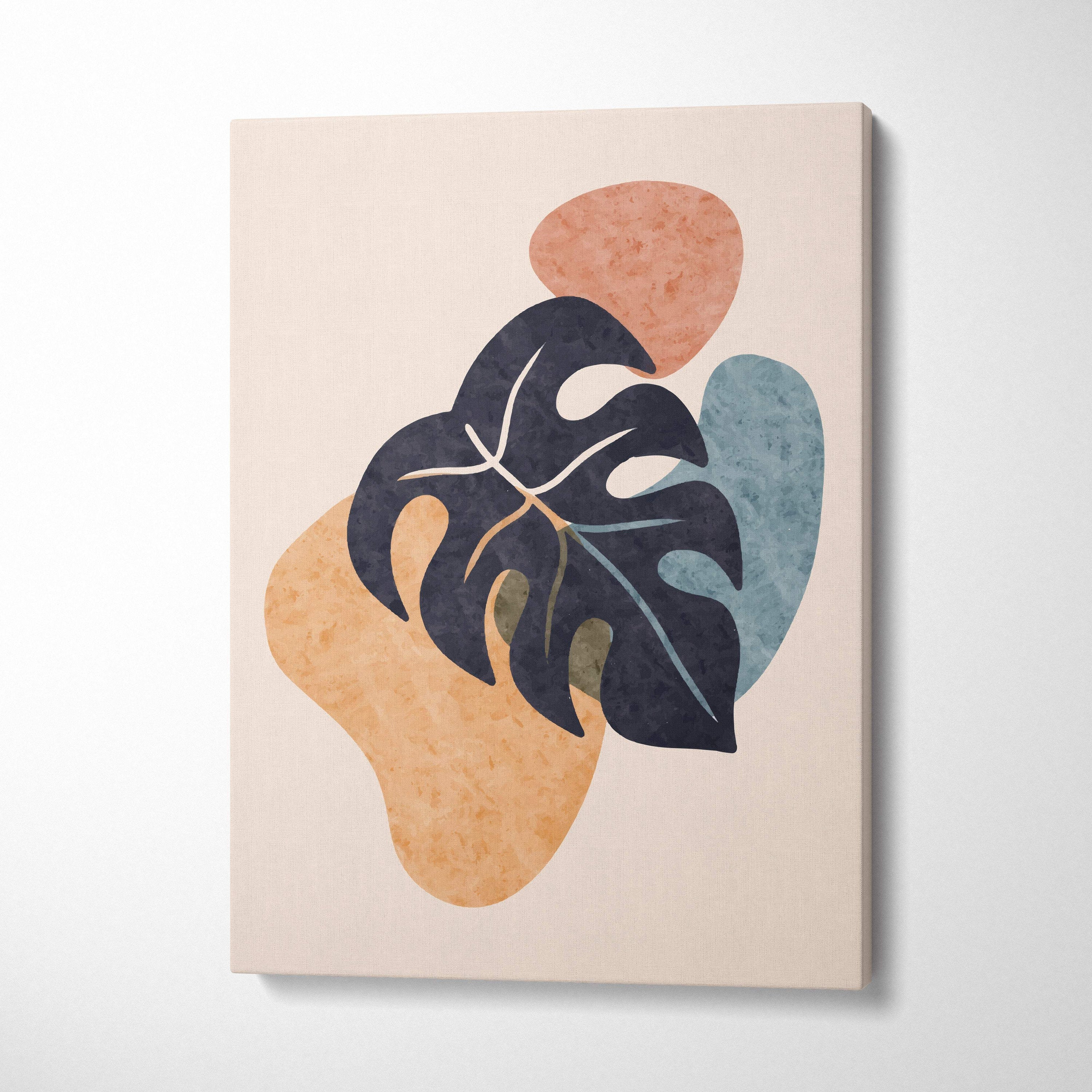 Modern monstera leaf abstract wall art with bold black leaf and white veins on peach terracotta and blue shapes on beige background