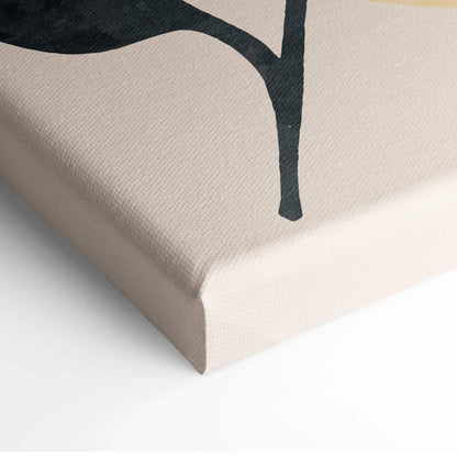 Beige canvas print with bold black abstract botanical leaf silhouette