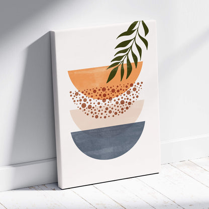 A modern abstract boho geometric canvas print with layered terracotta half circles and green botanical leaf for minimalist decor