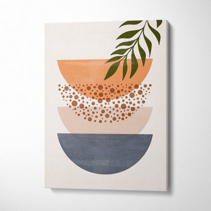 Modern abstract canvas print with stacked terracotta blush pink and slate gray bowls and a green leafy branch accent