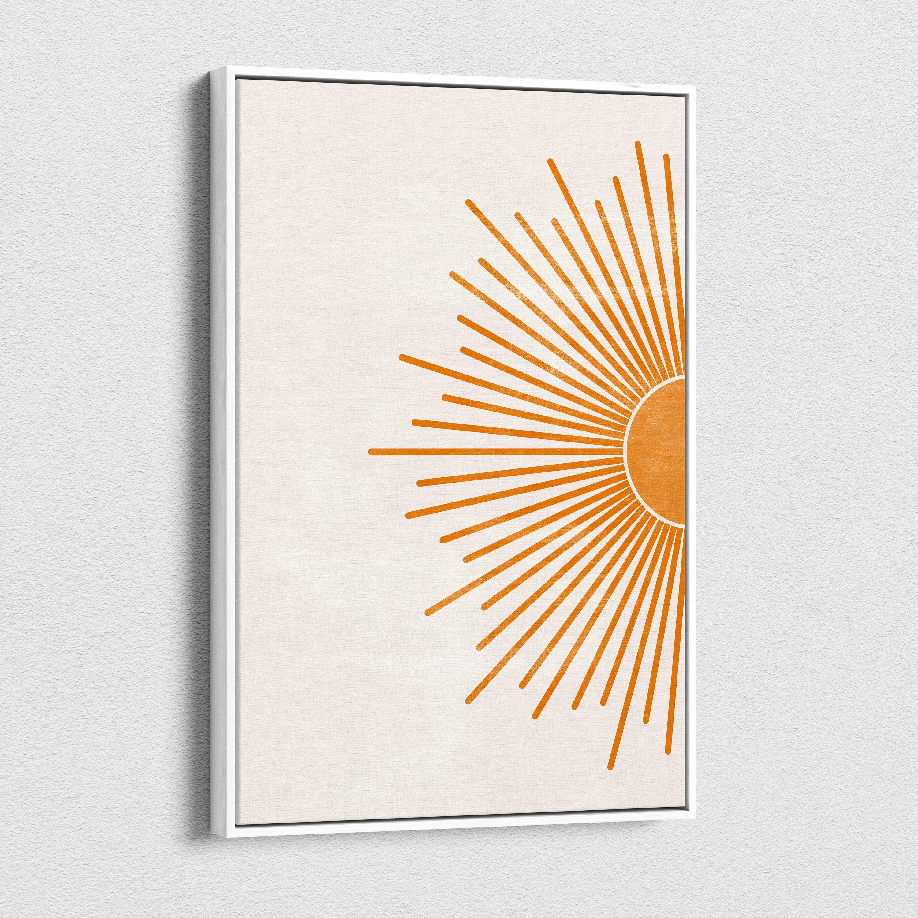 Minimalist framed canvas print with stylized orange sunburst on beige background for mid-century modern decor