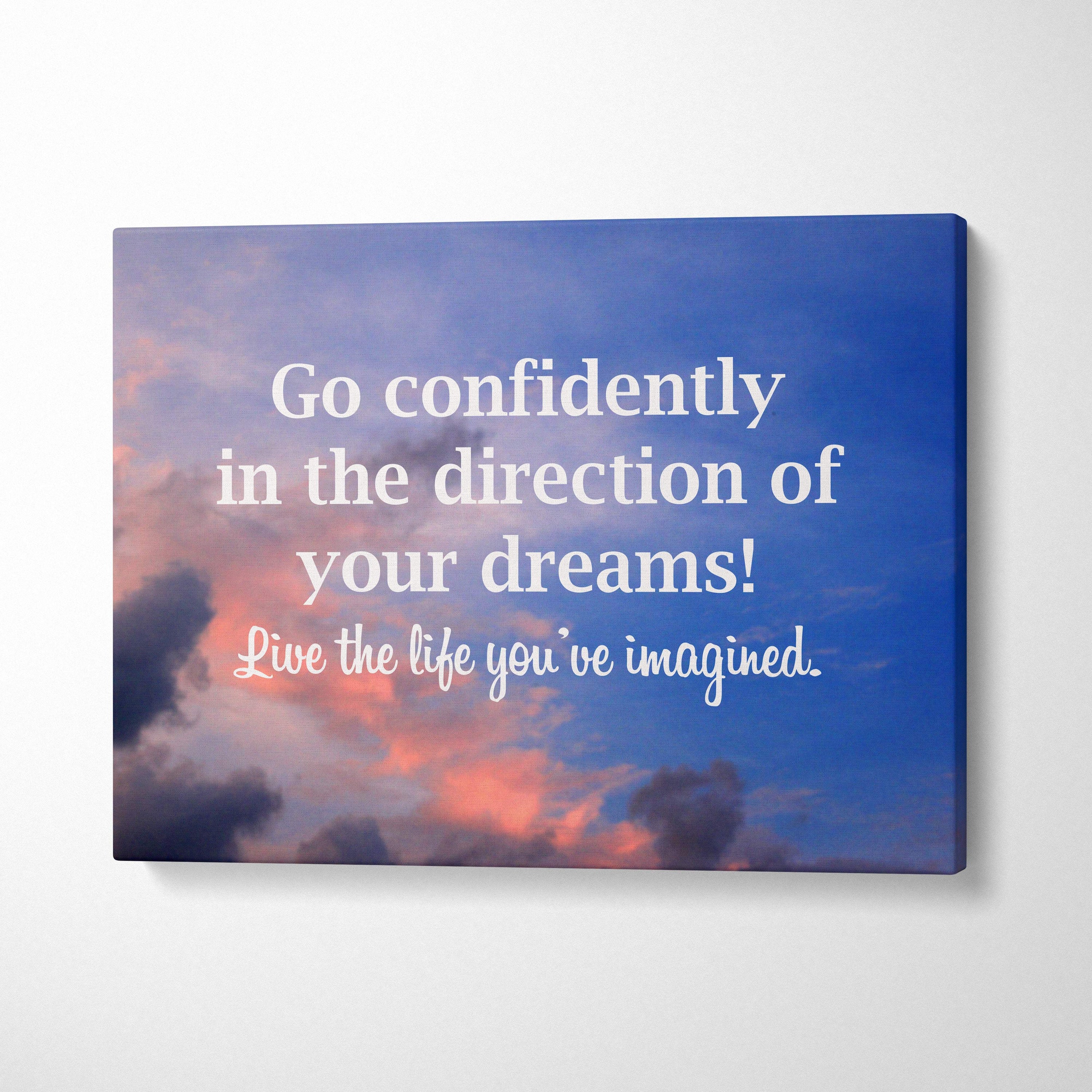 Blue canvas wall art with sunset sky and motivational go confidently in the direction of your dreams quote print