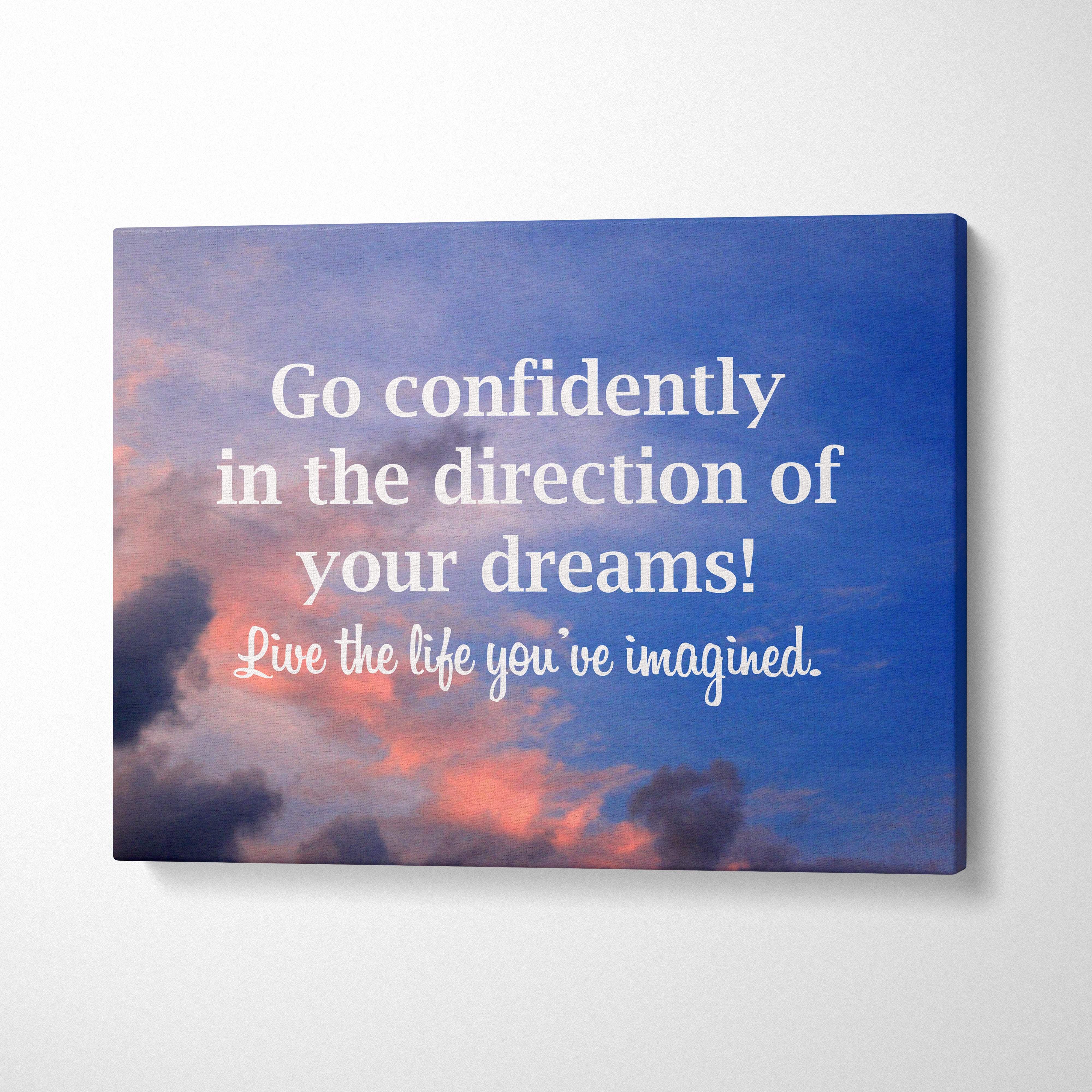 Blue canvas wall art with sunset sky and motivational go confidently in the direction of your dreams quote print