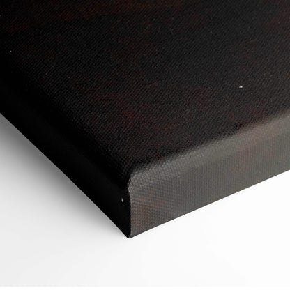Black canvas with textured surface and visible weave in abstract mountain landscape wall art with earth tone hills