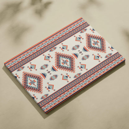 Southwestern tribal geometric diamond canvas art in coral navy cream