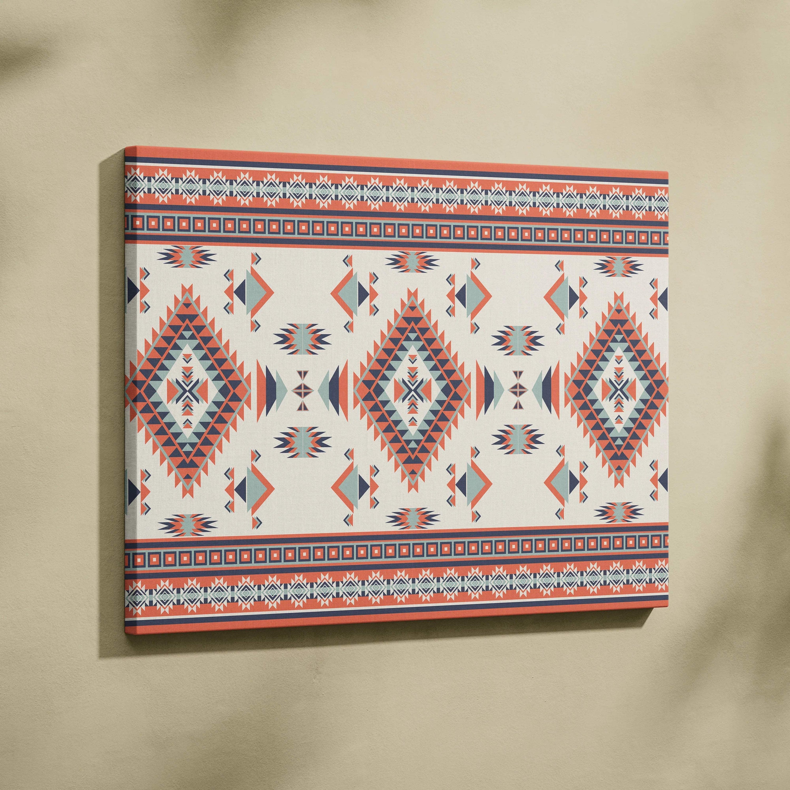 Southwestern tribal geometric diamond canvas art in coral navy cream