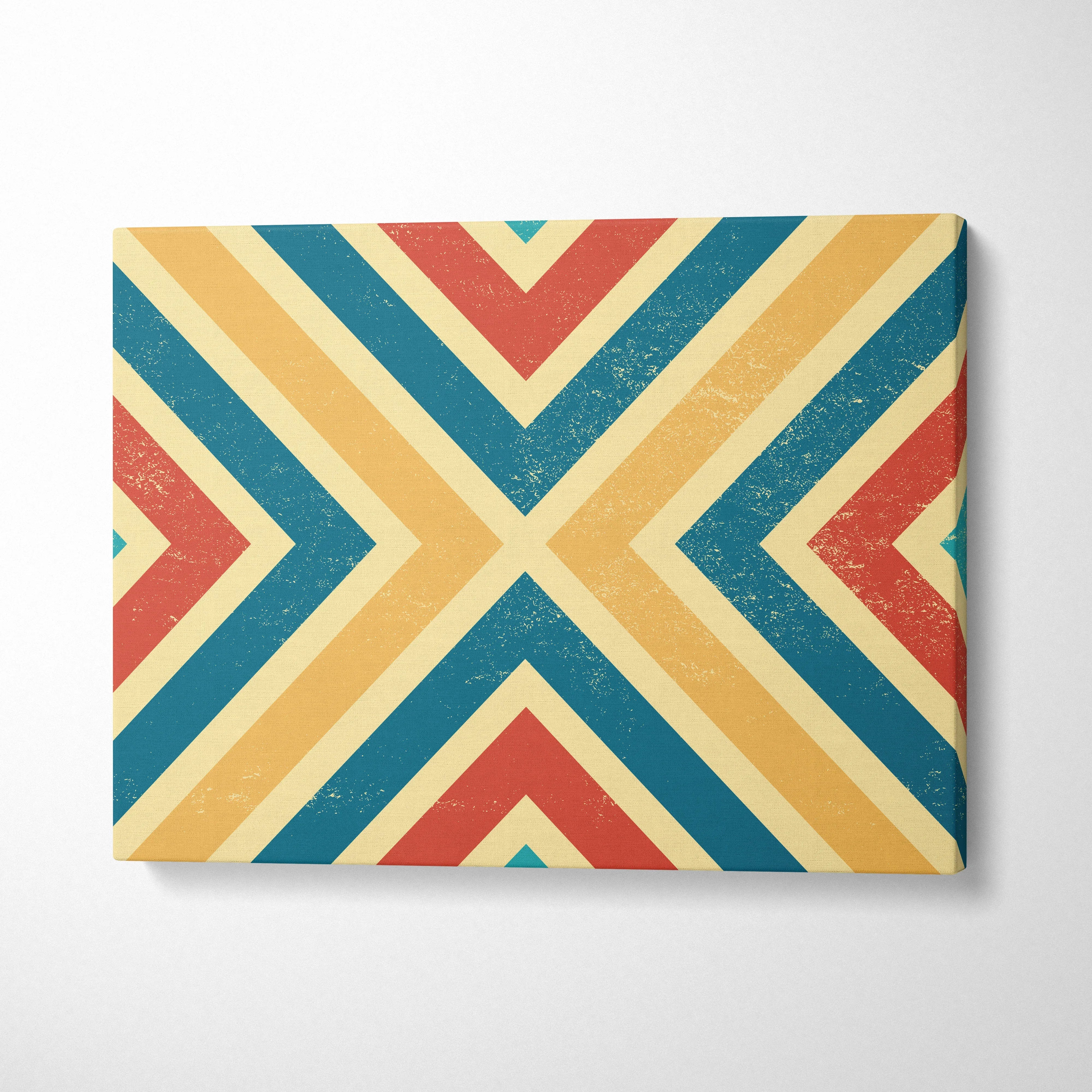 Retro chevron canvas wall art in teal, mustard, red with distressed texture