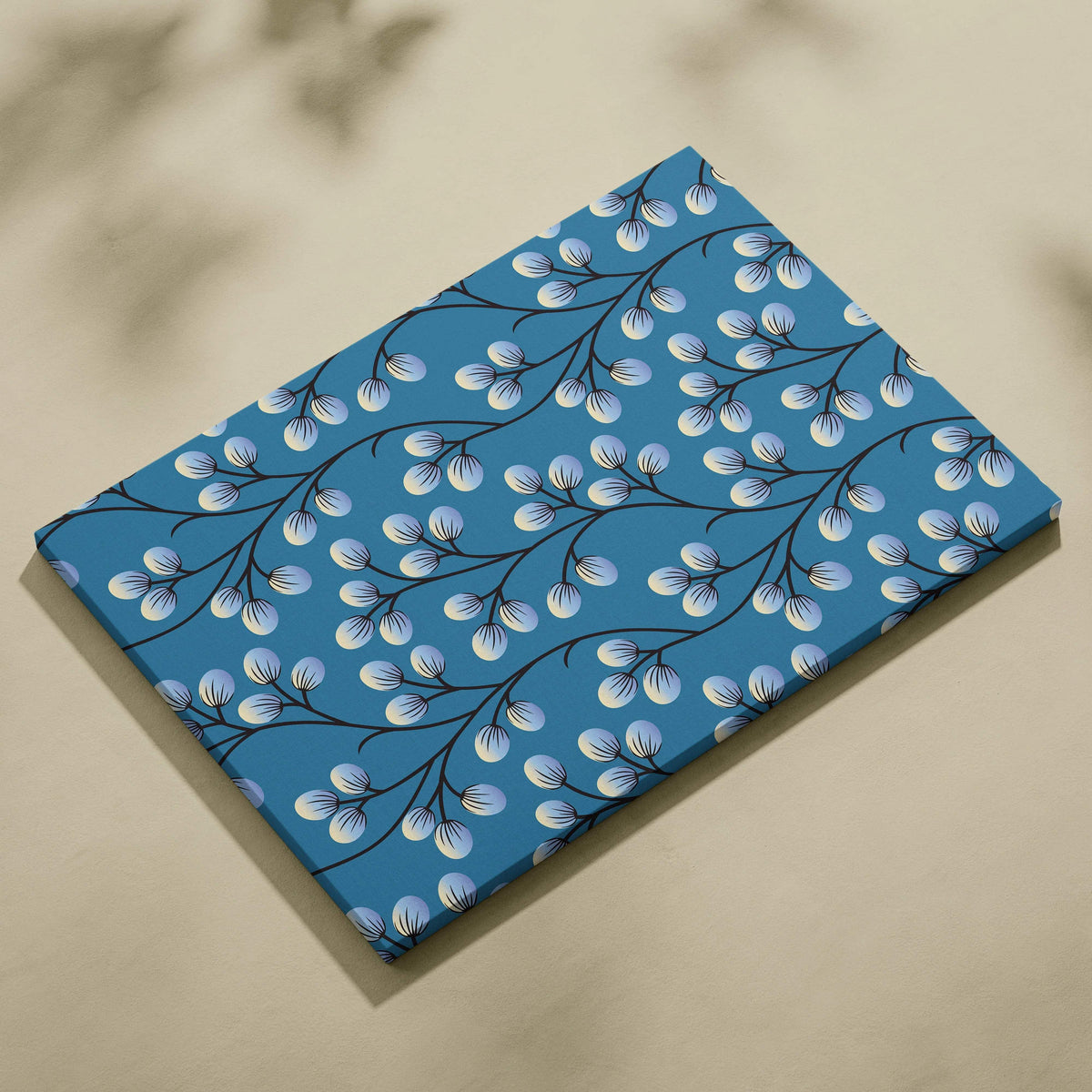 Minimalist blue canvas wall art with white berries on willow branches