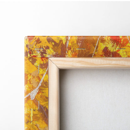 A wooden frame featuring a vibrant abstract painting in yellow and orange titled golden autumn forest sunlight wall art