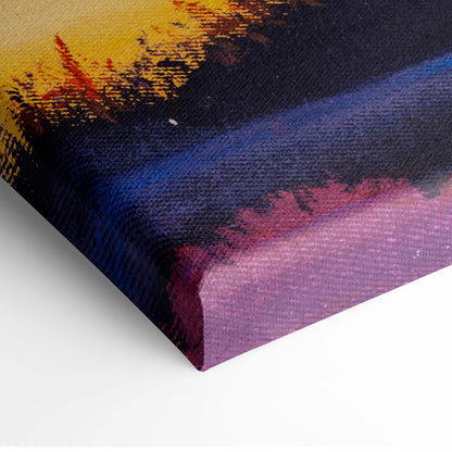 A vibrant abstract canvas print featuring bold yellow deep blue and purple brushstrokes on textured fabric surface