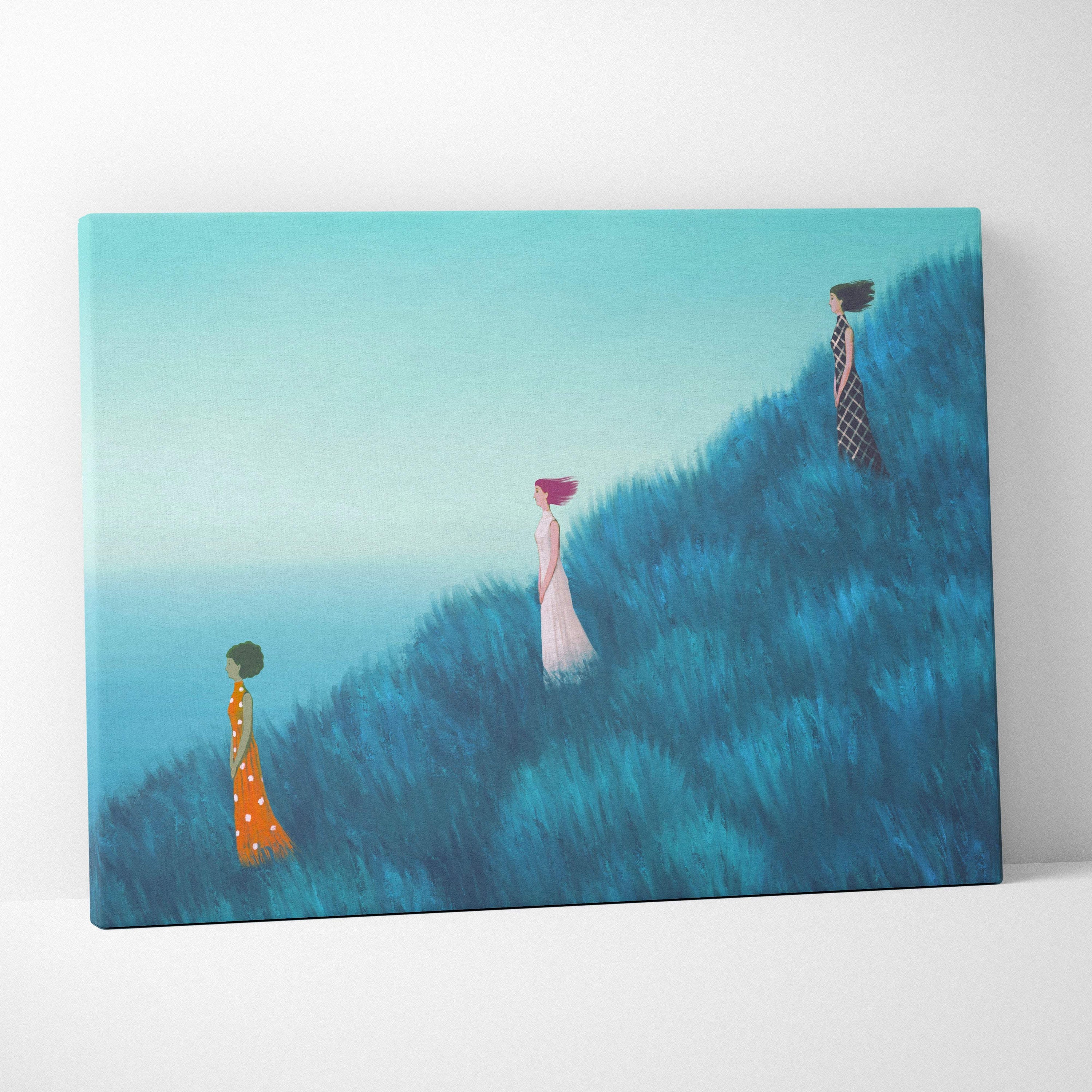 A rectangular canvas wall art featuring three stylized women in flowing dresses against a gradient blue landscape