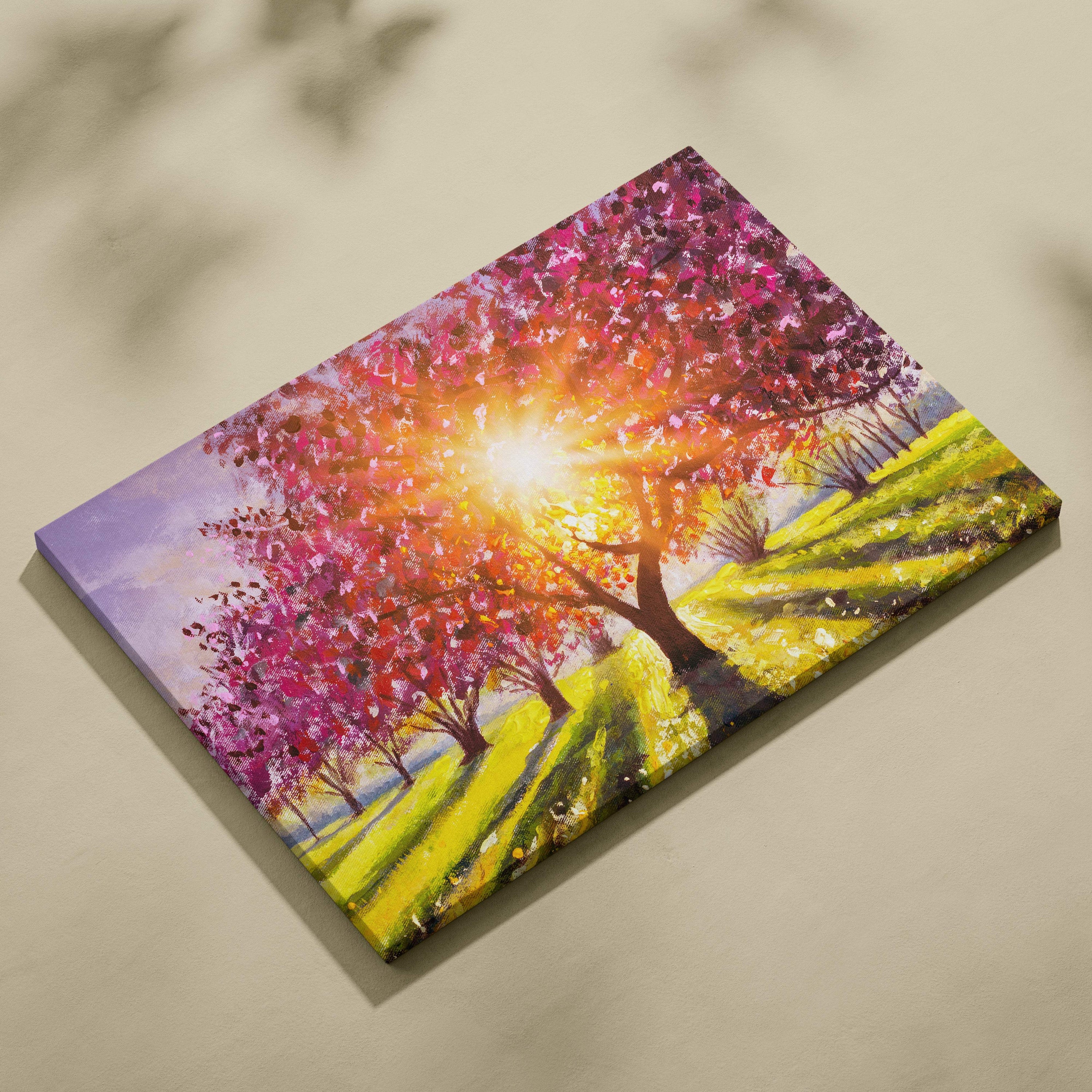 Vibrant canvas painting of sunlit pink and purple blossom tree with golden light rays in orchard landscape wall art