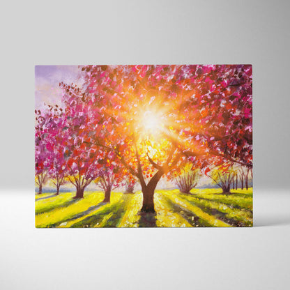 Vibrant canvas print of a radiant blossom orchard with sunlit pink and red trees and golden light rays landscape