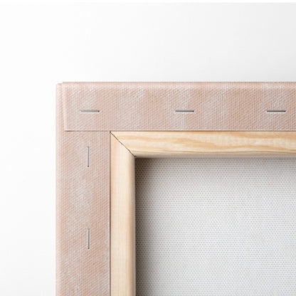 Warm desert landscape wall art with light pink canvas on natural wood frame featuring visible stitching edges