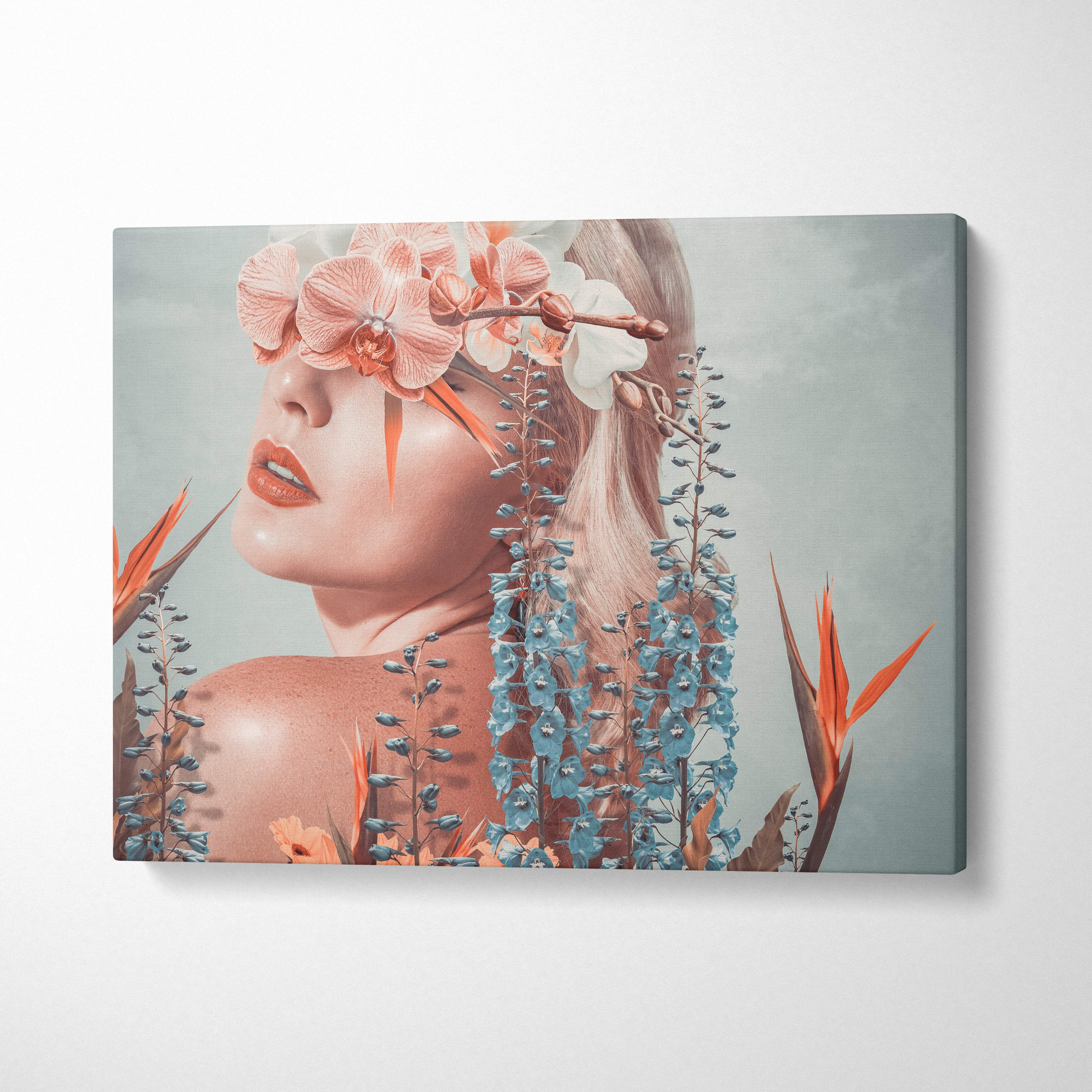 Rectangular contemporary floral woman canvas wall art with peach orchids and blue flowers in a tropical crown design