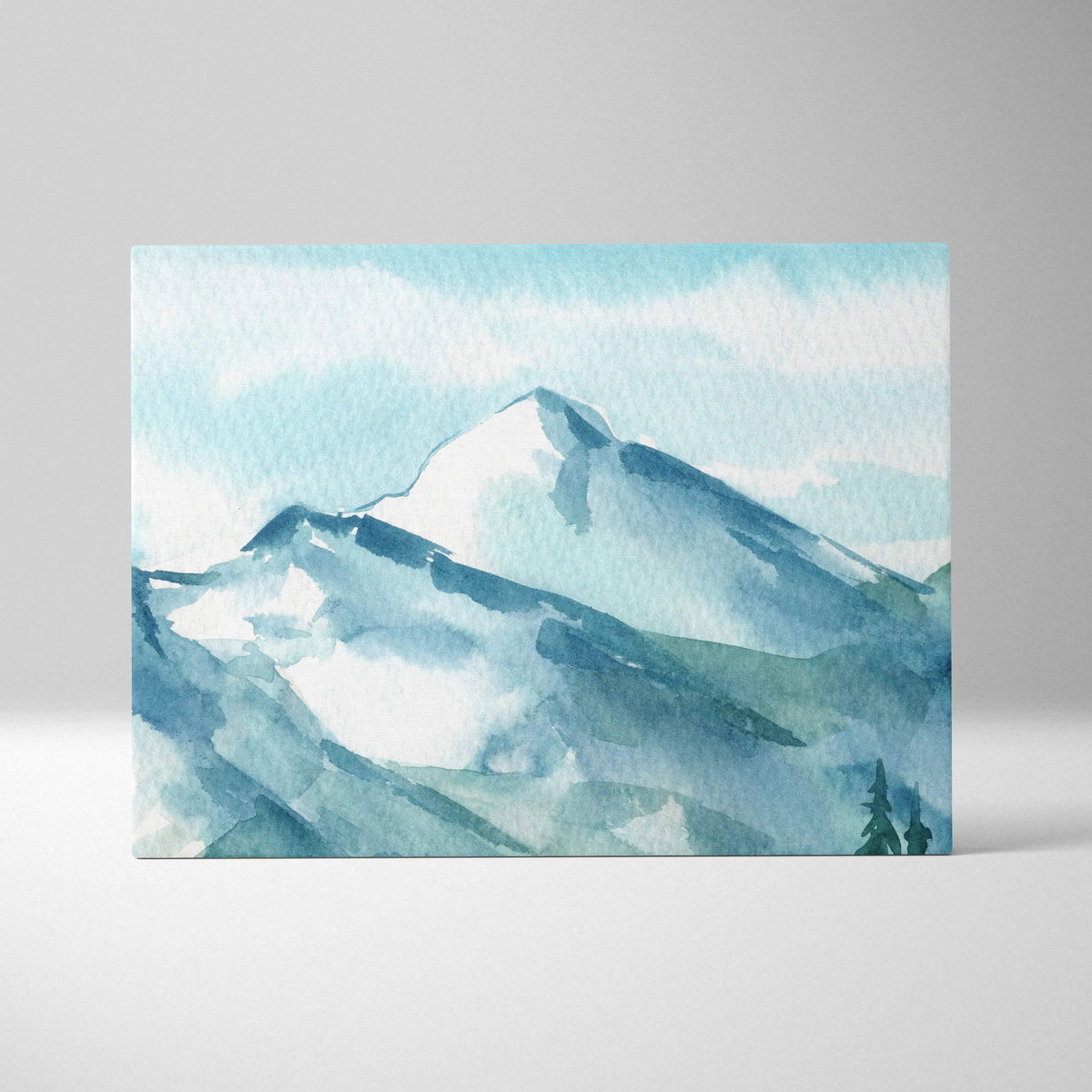 Serene misty mountain watercolor canvas art in blue teal tones with pines
