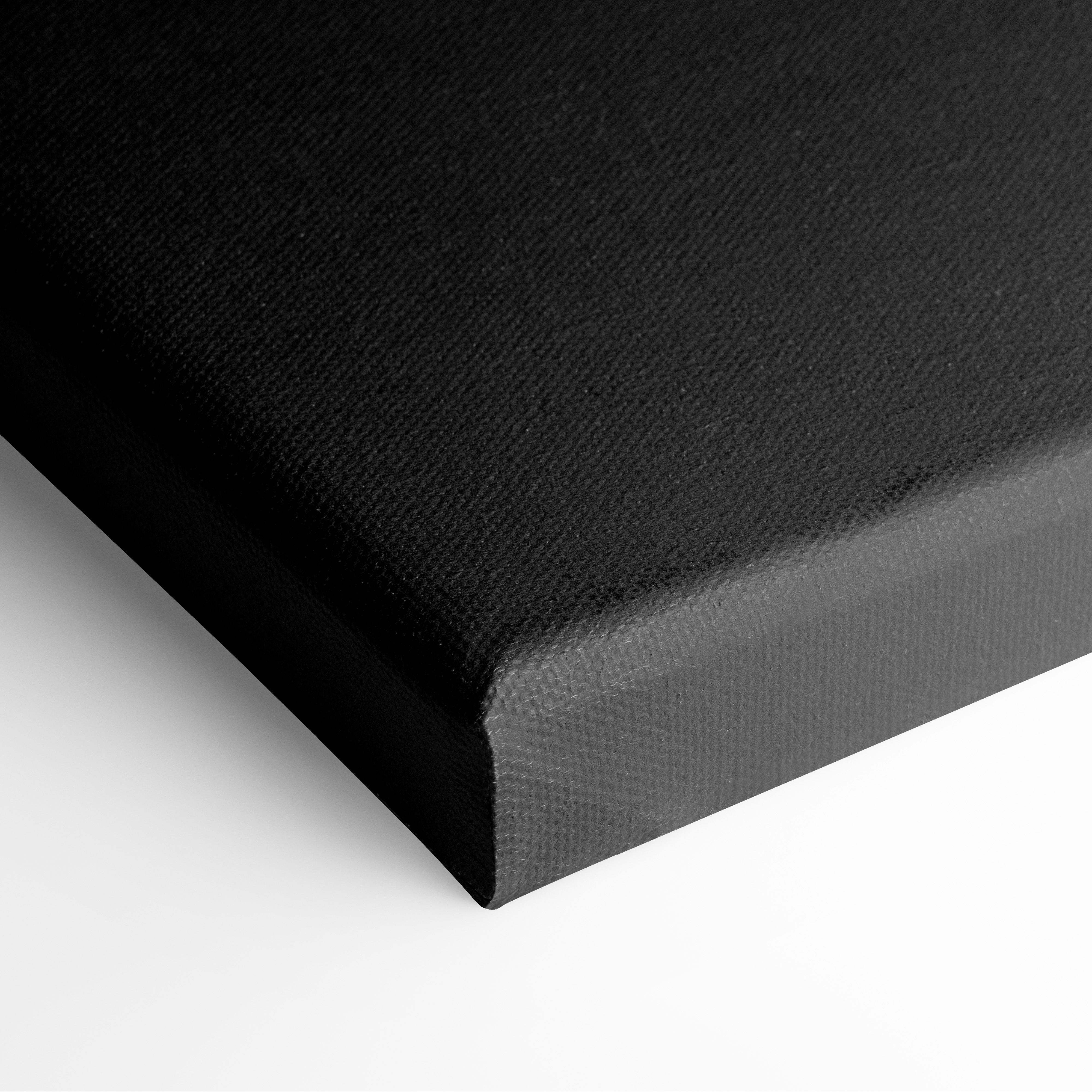 Black canvas wall art with textured surface and reinforced edges featuring modern motivational typography print