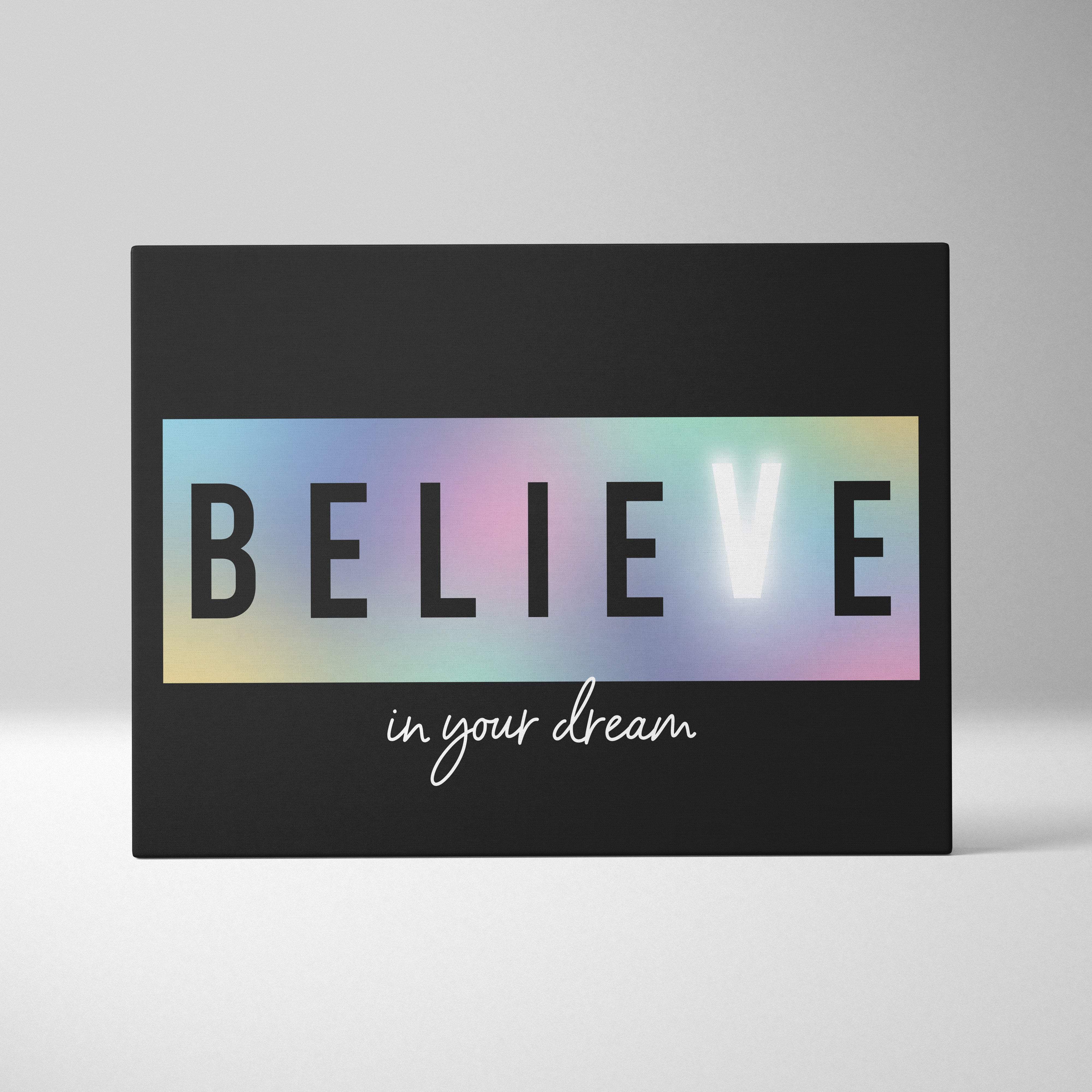 Black rectangular canvas wall art with bold believe over rainbow gradient and cursive in your dream for bedroom or office decor