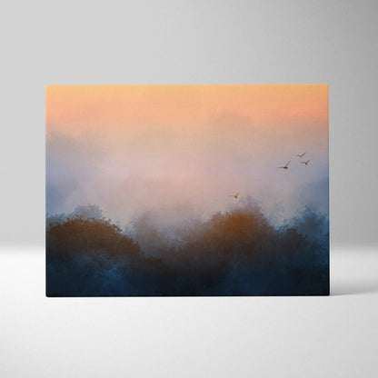 Abstract watercolor sunrise canvas print with moody blue forest silhouettes