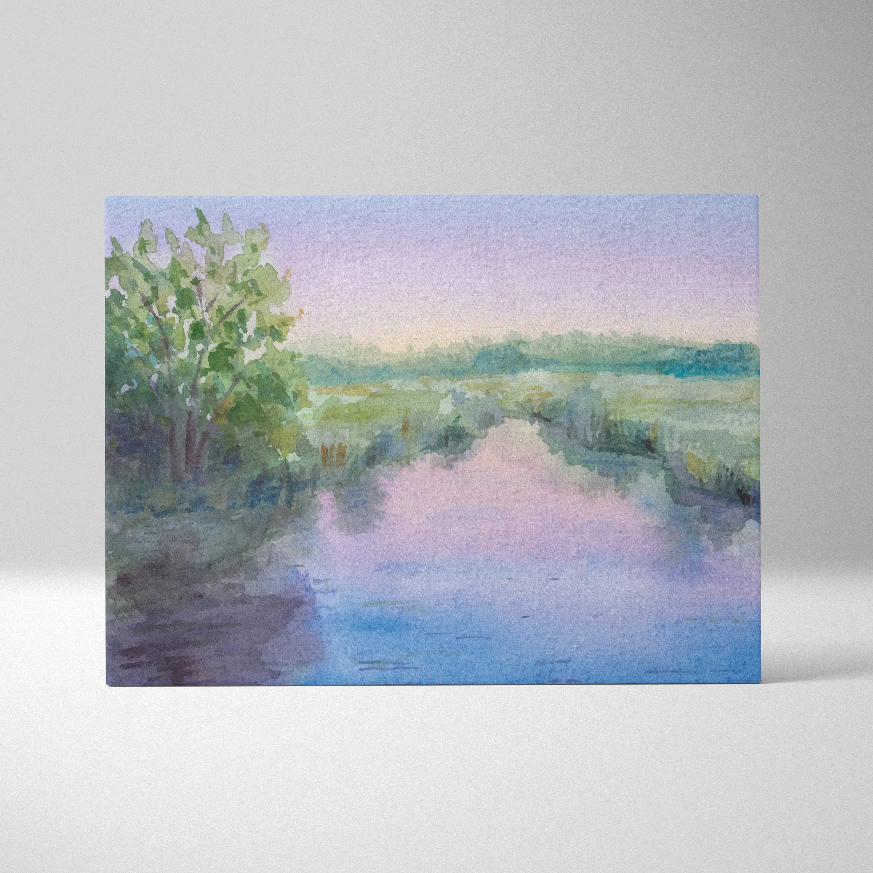 Soft pastel watercolor river landscape with green marsh, trees, pink blue sky on canvas