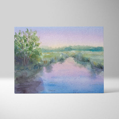 Soft pastel watercolor river landscape with green marsh, trees, pink blue sky on canvas