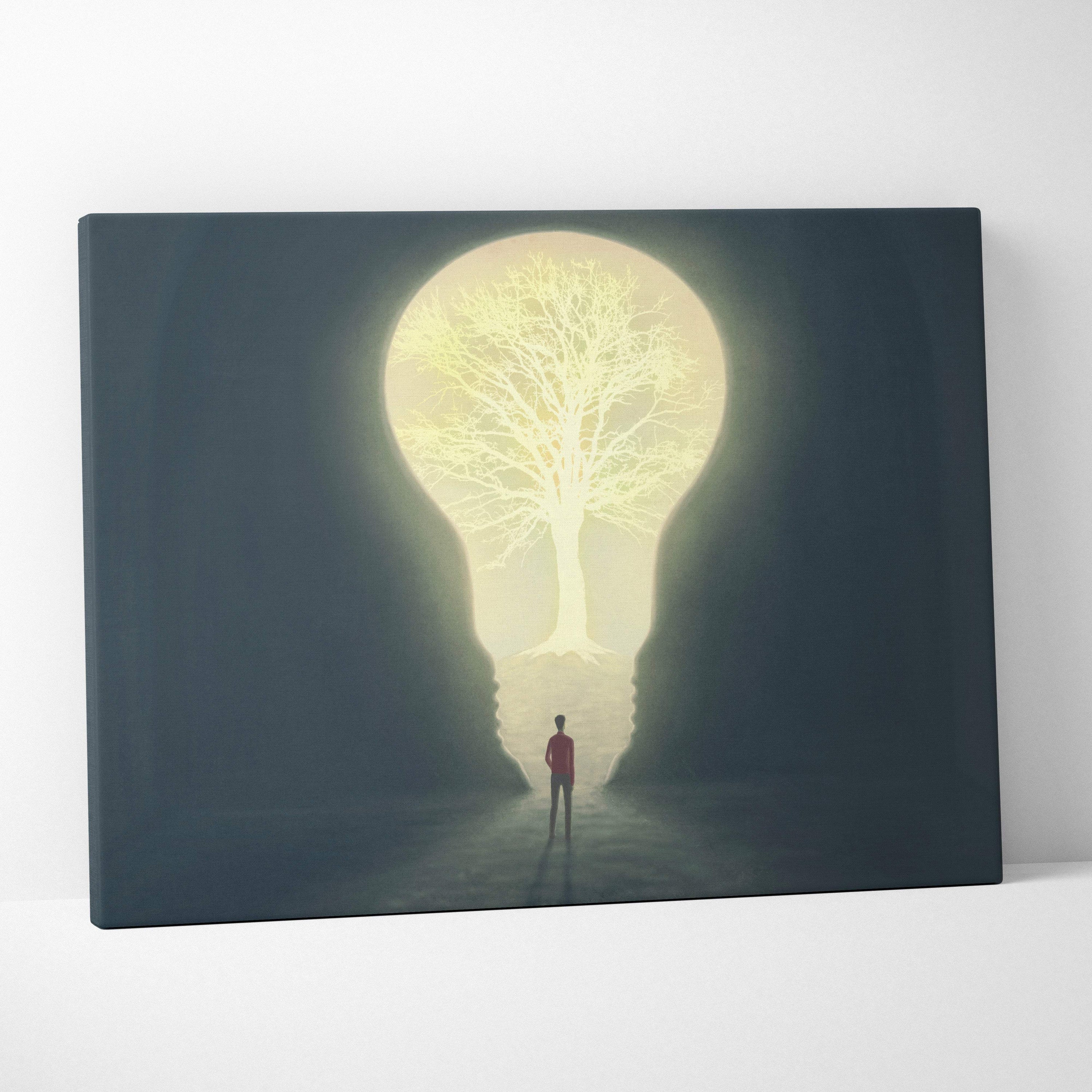 Contemporary canvas print of a glowing golden-yellow tree inside a light bulb silhouette on a dark background