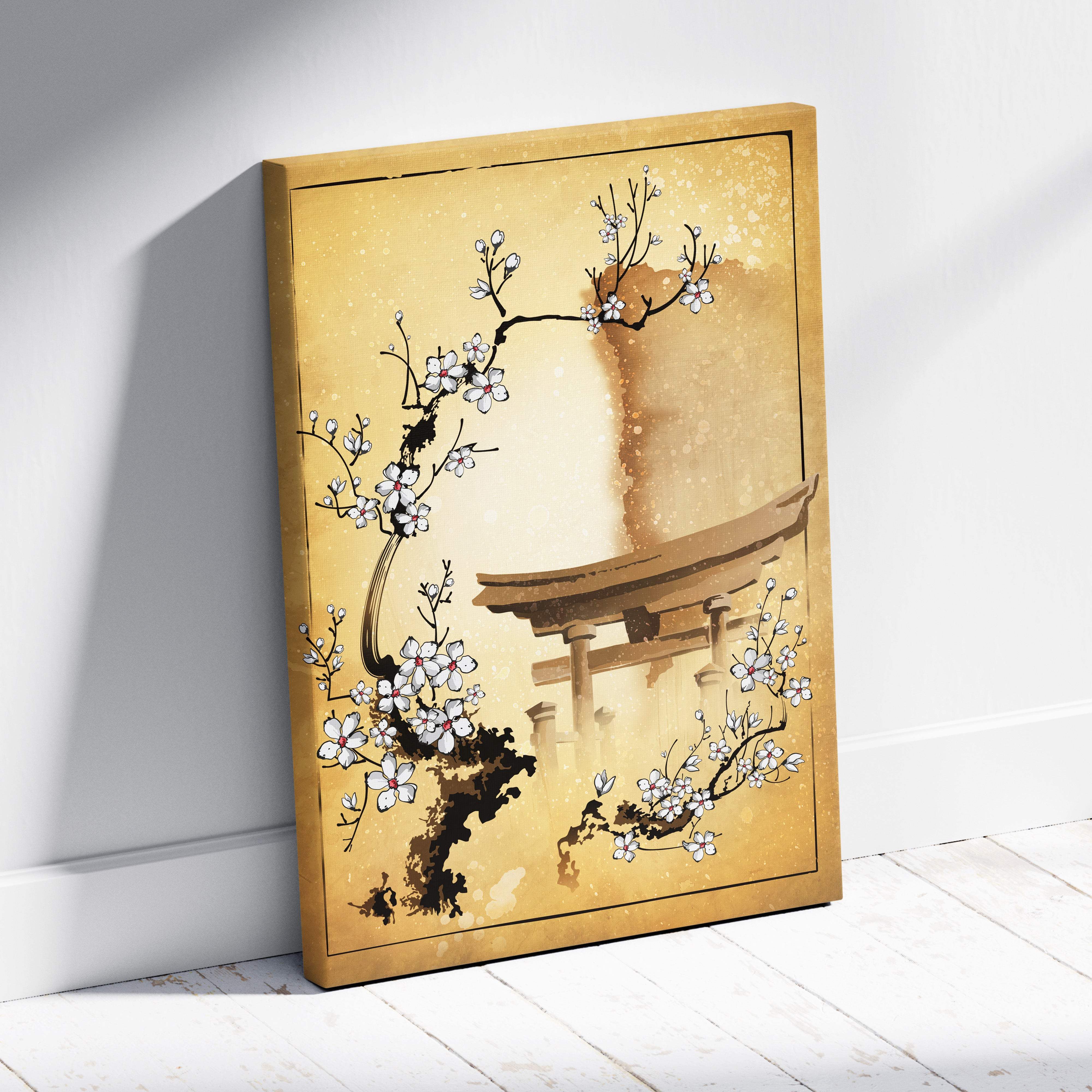 Golden-framed canvas print of white cherry blossom branch over japanese torii gate in soft watercolor tones for zen decor