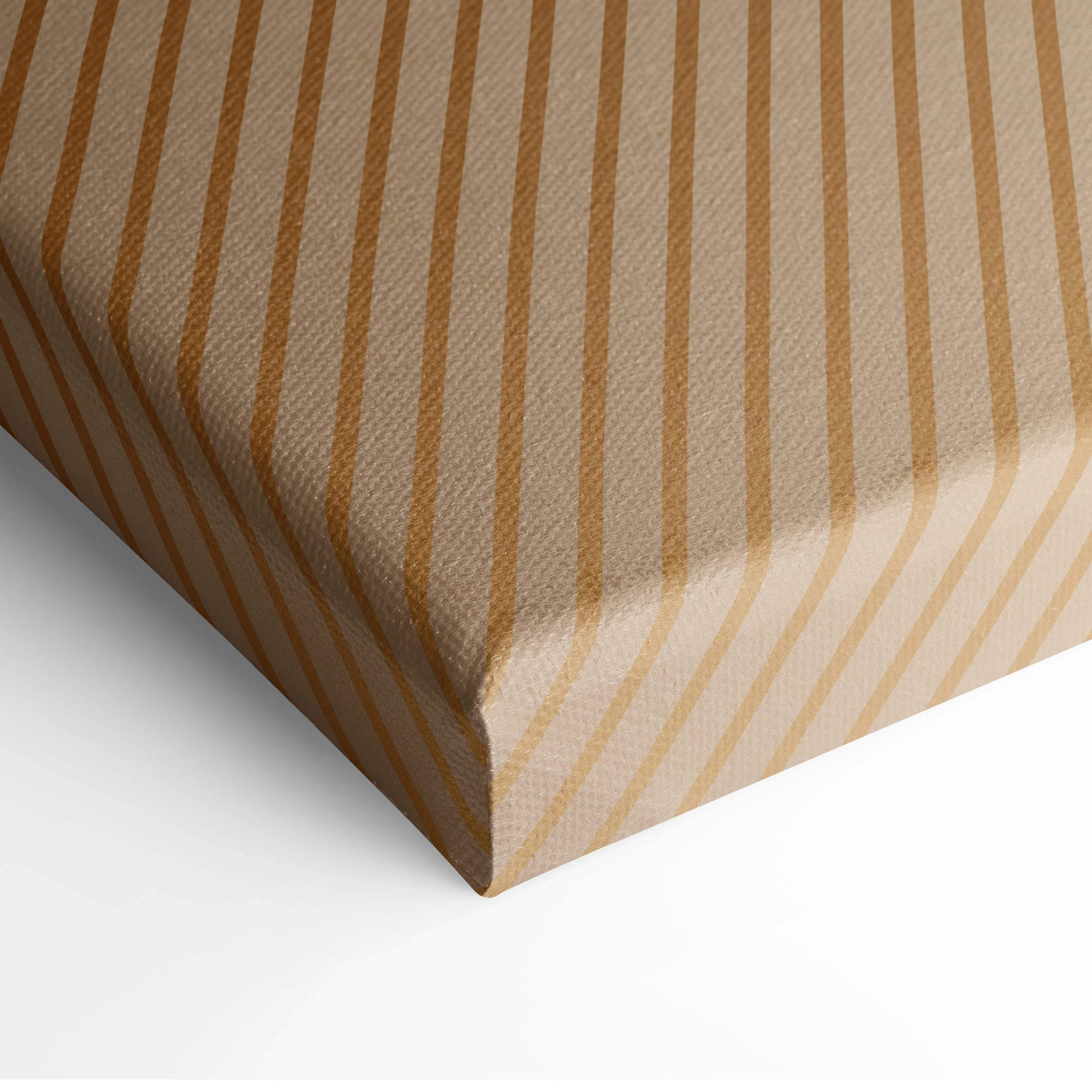 Back of geometric gold abstract canvas with beige gold striped paper