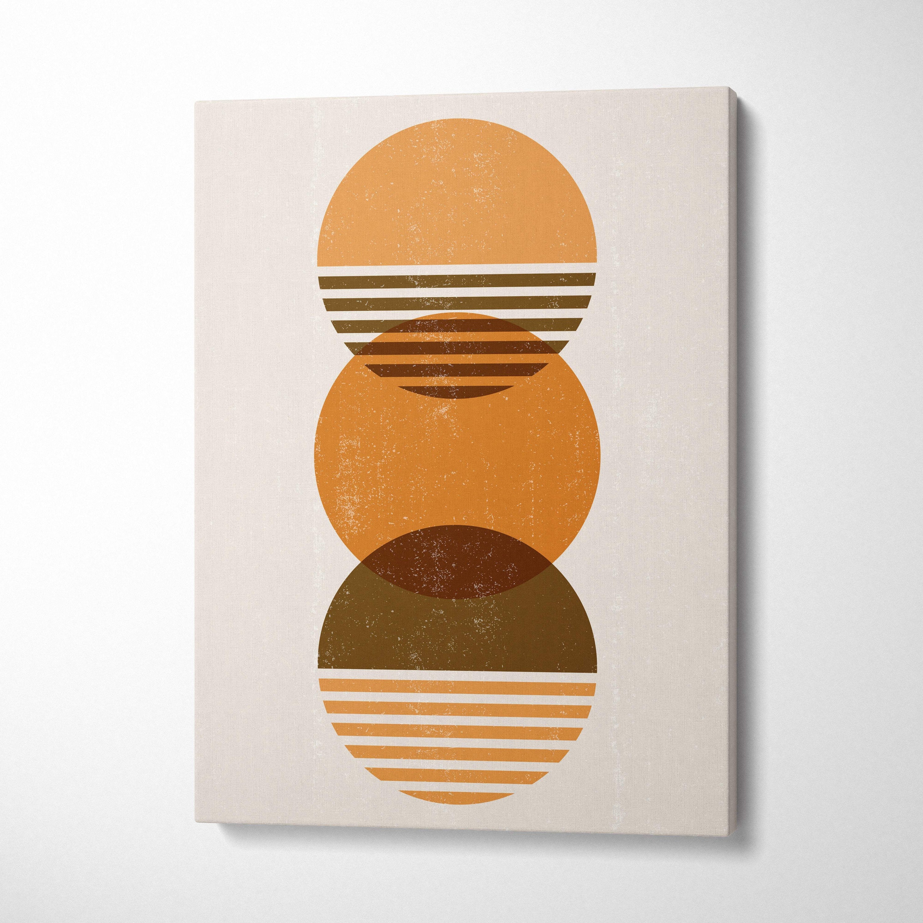 A minimalist canvas print featuring three overlapping horizontal striped circles in terracotta and ochre earth tones