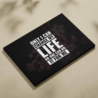 Black canvas print with bold white motivational text and subtle floral background ideal for bedroom or office decor
