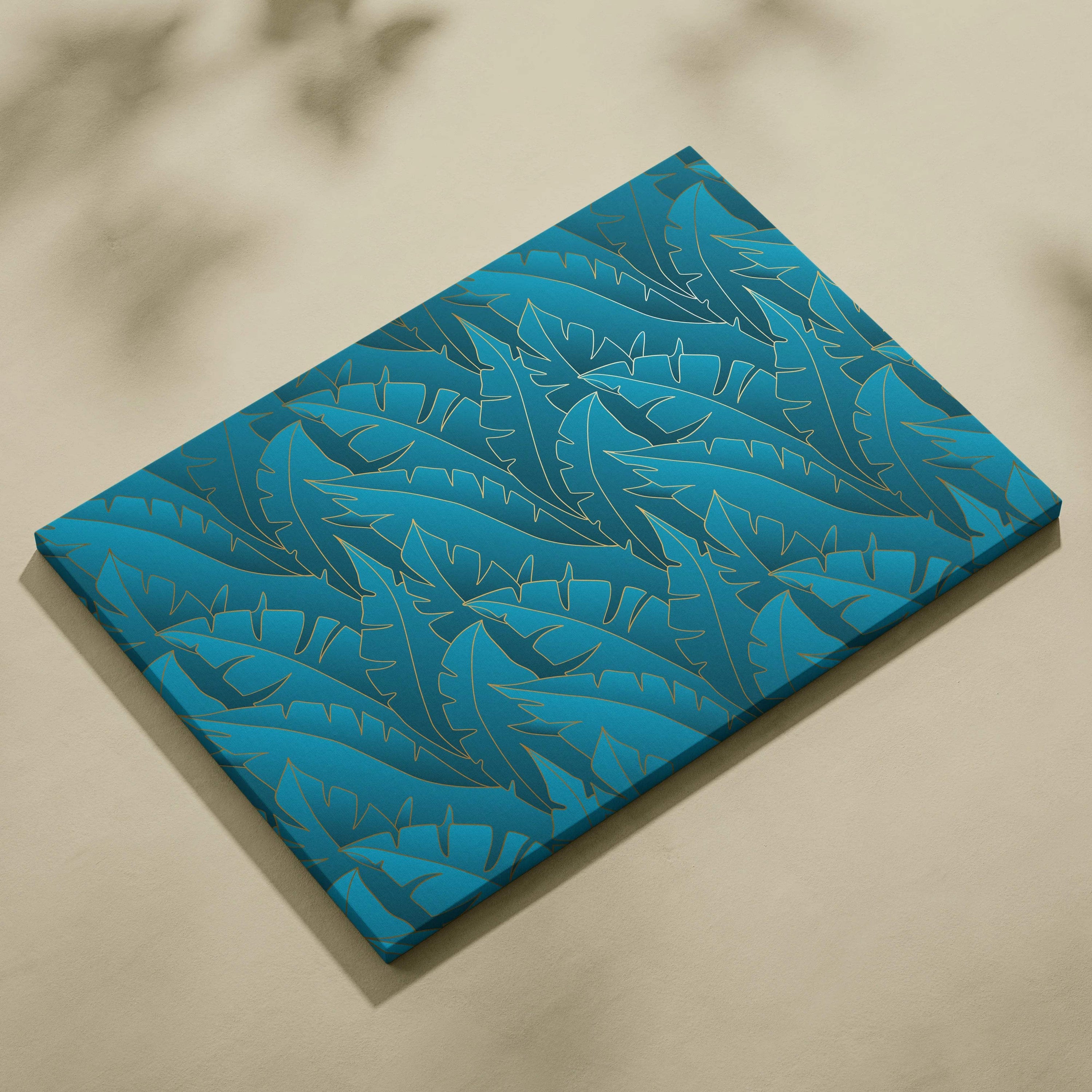 Luxe tropical leaf canvas wall art with gold foil on blue background