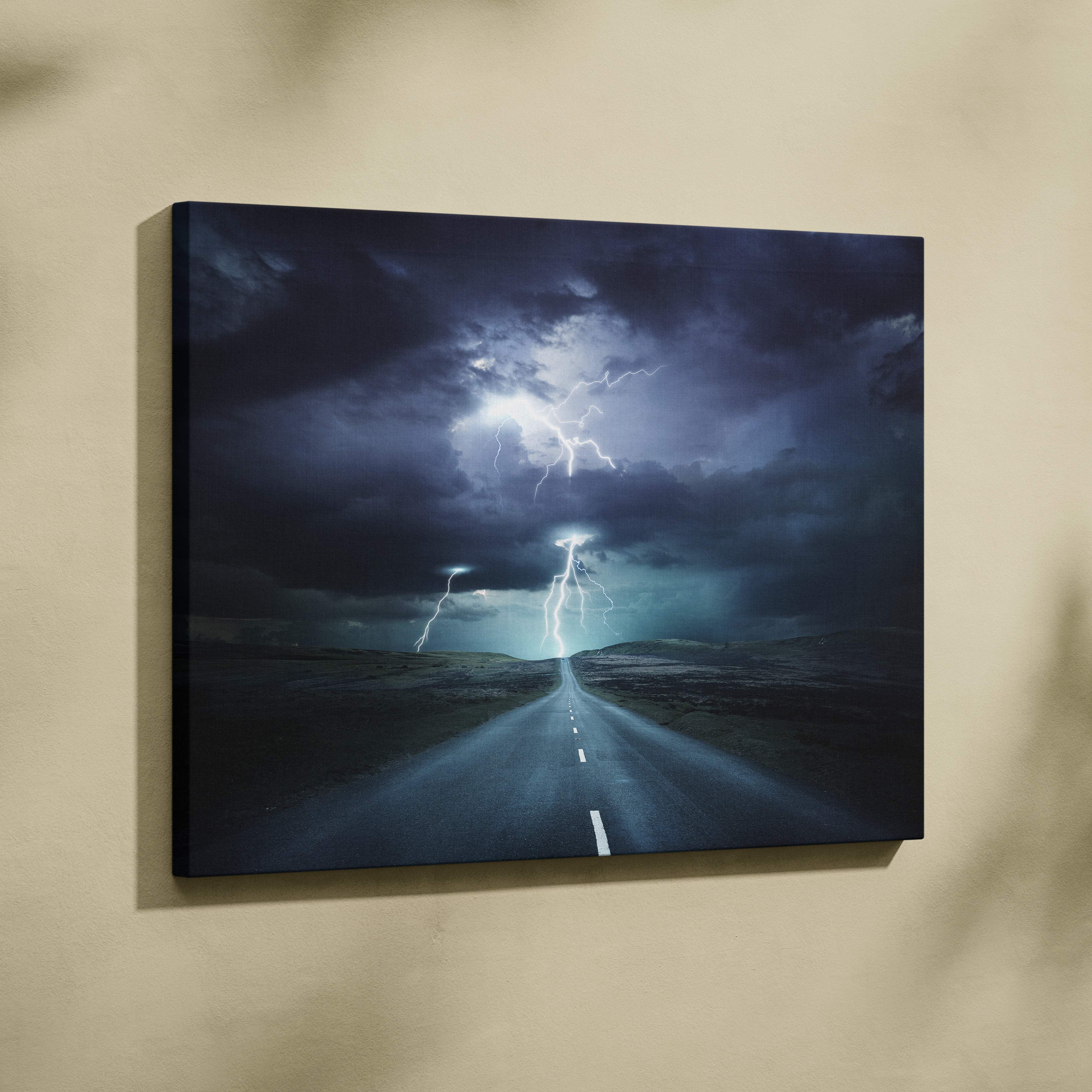 Dark canvas print of stormy road with multiple lightning strikes under dark blue sky for cinematic wall decor